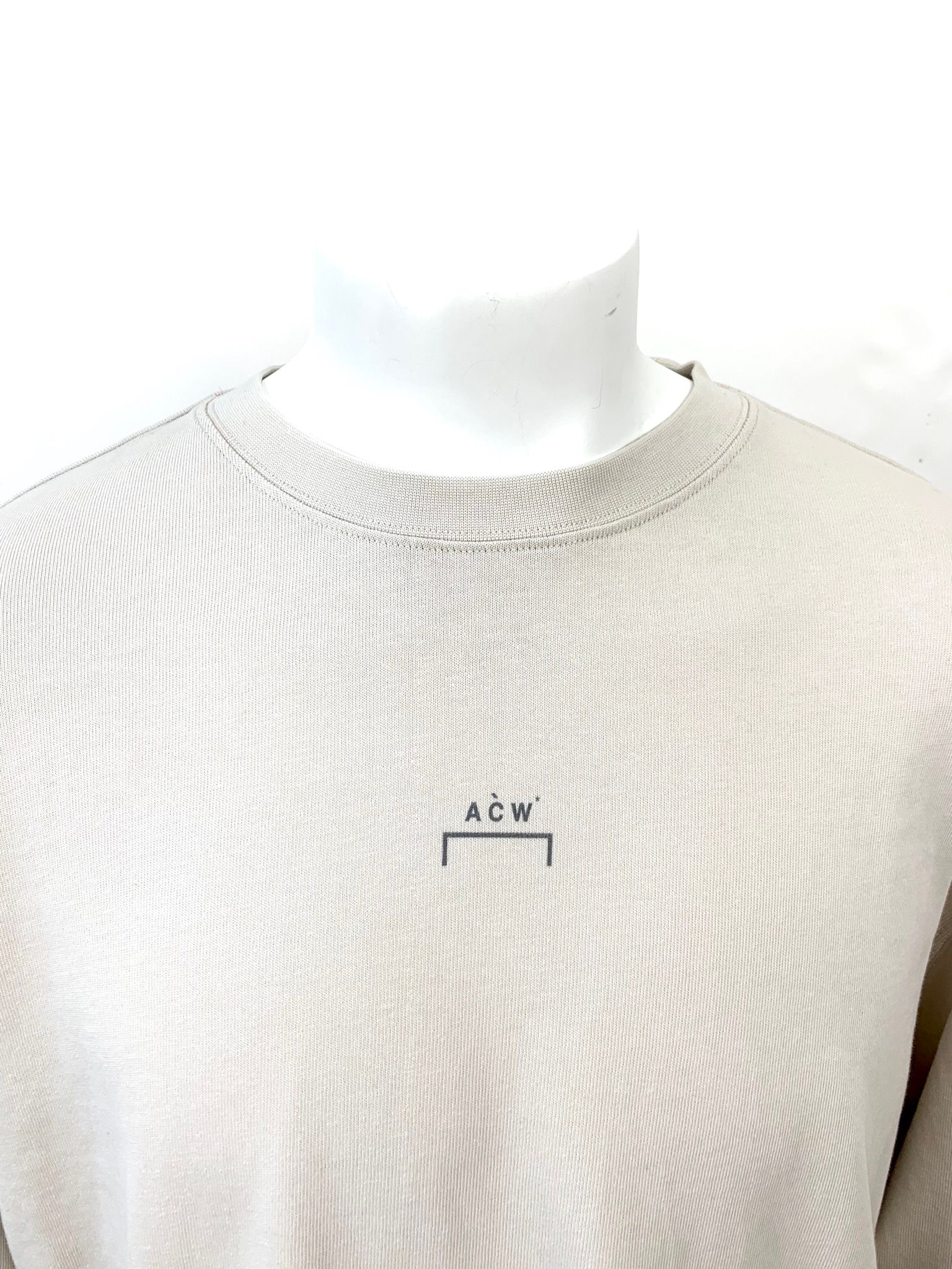 バックペイント ロングスリーブ ジャージTシャツ / COTTON SINGLE JERSEY STONE STENCIL LONG SLEEVE T-SHIRT / ベージュ × ブラック
