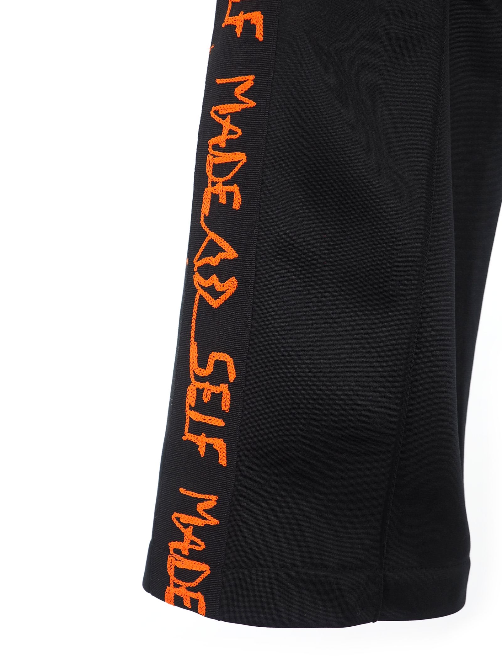 【20AW】サイドライン シグネクシャーロゴ トラックパンツ / ICONIC TRACKSUIT PANT