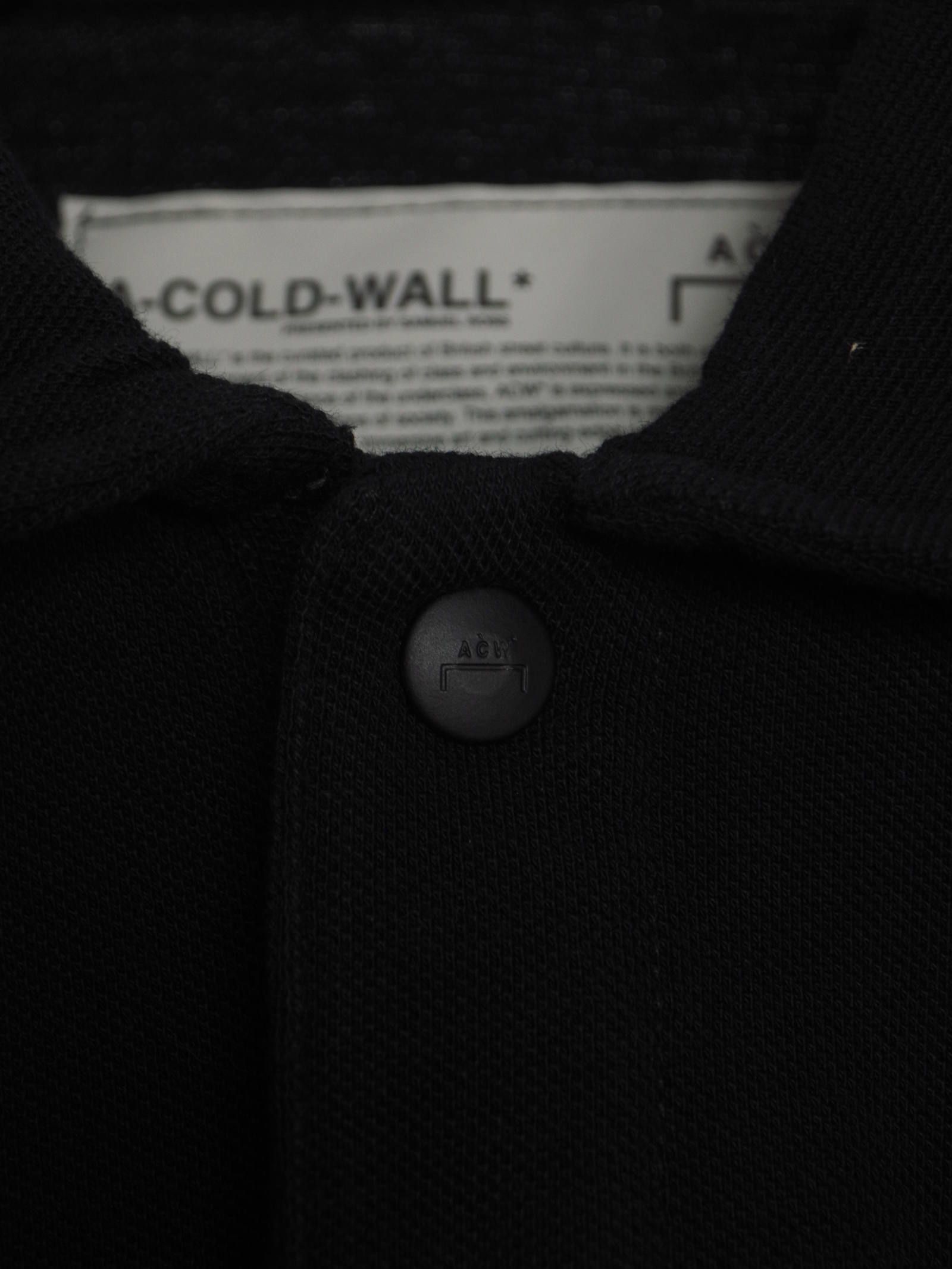パネルロゴ ポロシャツ RHOMBUS BADGE POLO BLACK