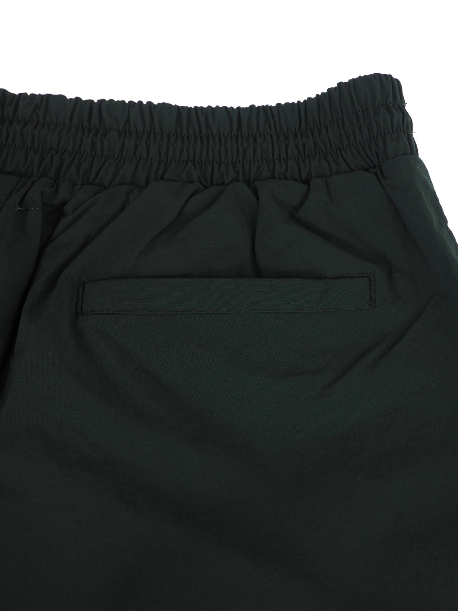 テーププリント トラックパンツ / BRACKET TAPED TRACK PANTS DEEP TEAL / グリーン × ホワイト