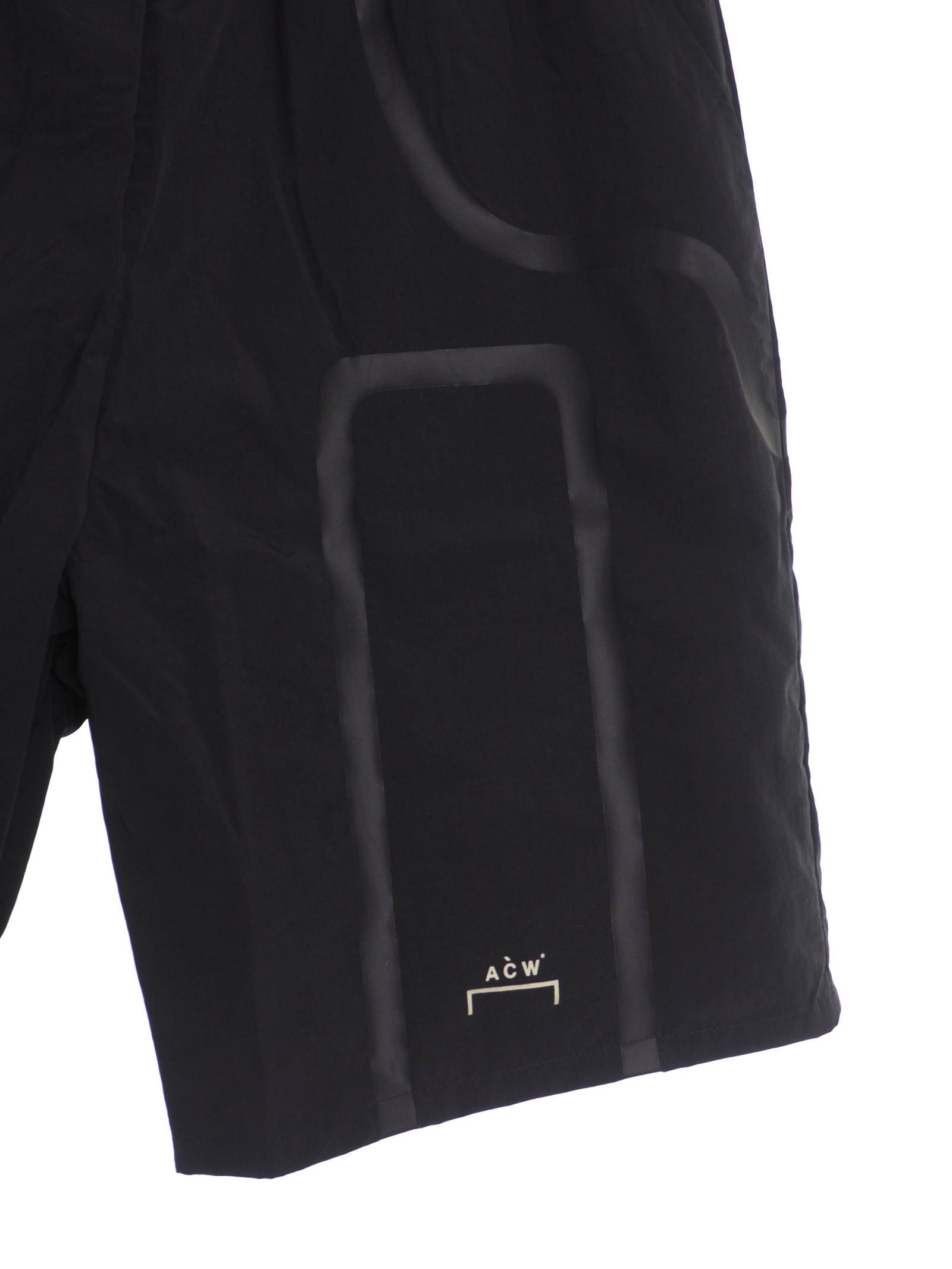 テーププリント ハーフ トラックショーツ BRACKET TAPED TRACK SHORTS BLACK