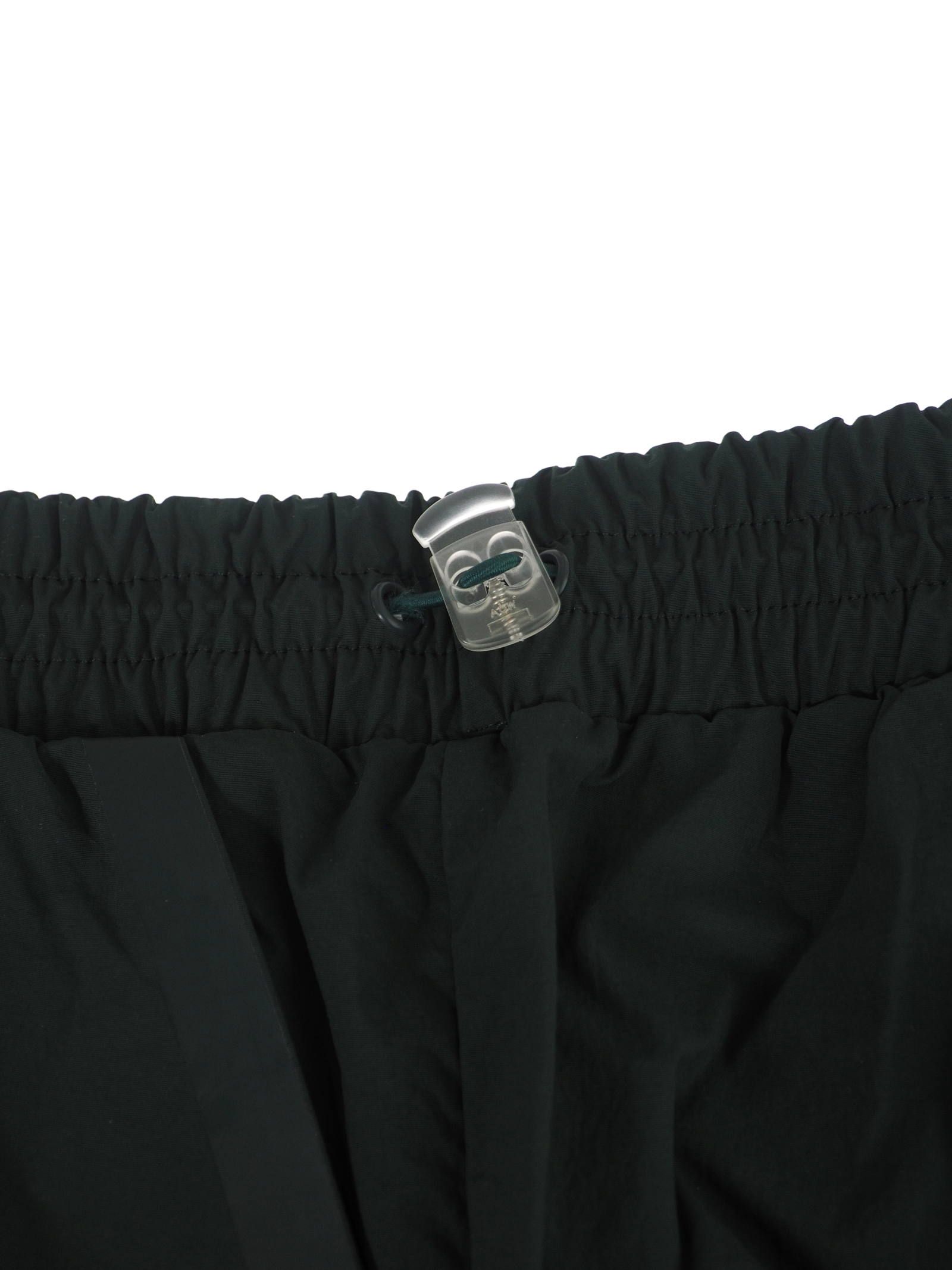 テーププリント トラックパンツ / BRACKET TAPED TRACK PANTS DEEP TEAL / グリーン × ホワイト