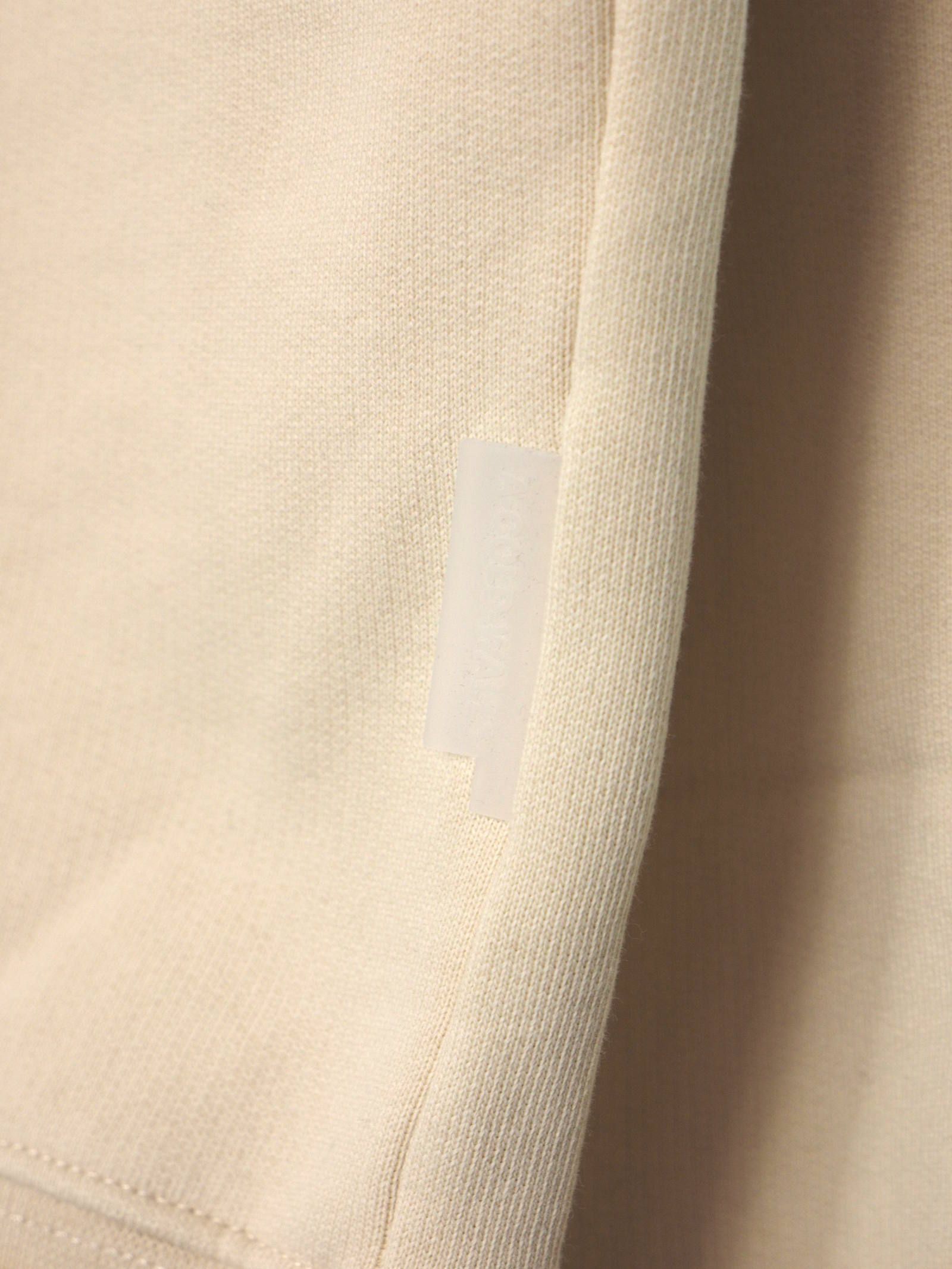 ロゴジップフーディー パーカー LOGO ZIP HOODY ALMOND MILK