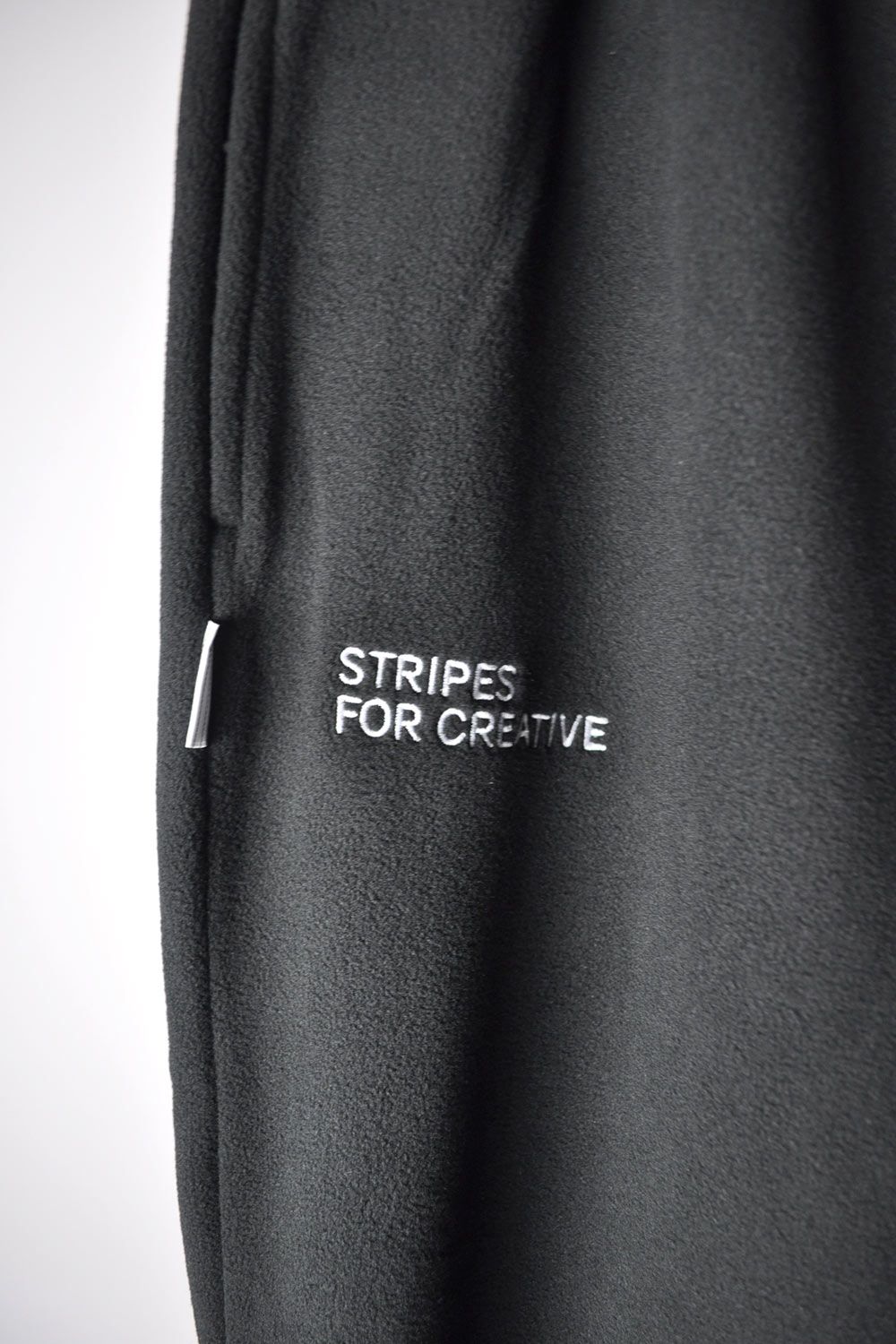 Stripes For Creative - FLEECE SPORTY PANTS. | Stripe Online Store