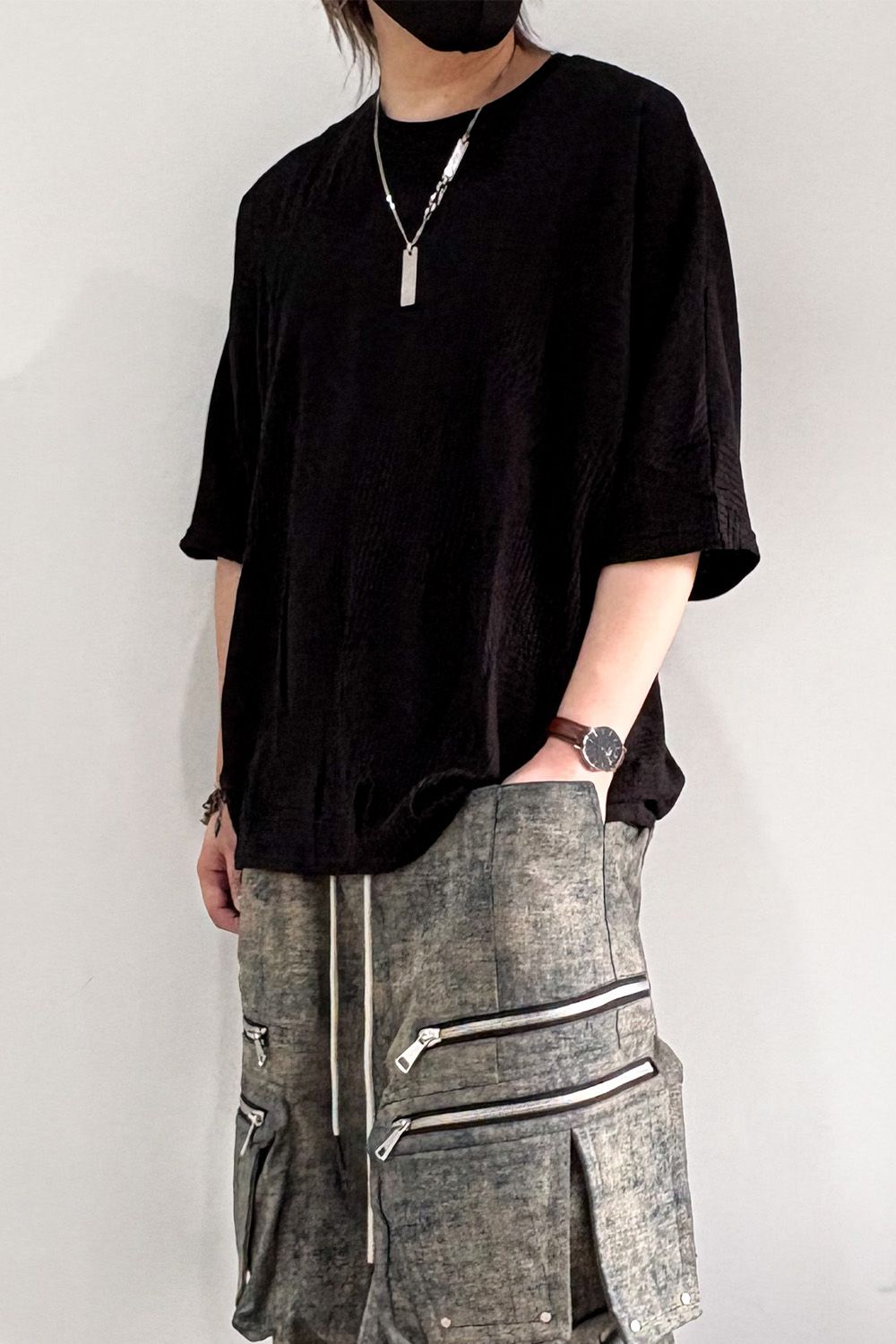 DEFORMED STRIPE PATTERN DOLMAN TEE / ブラック