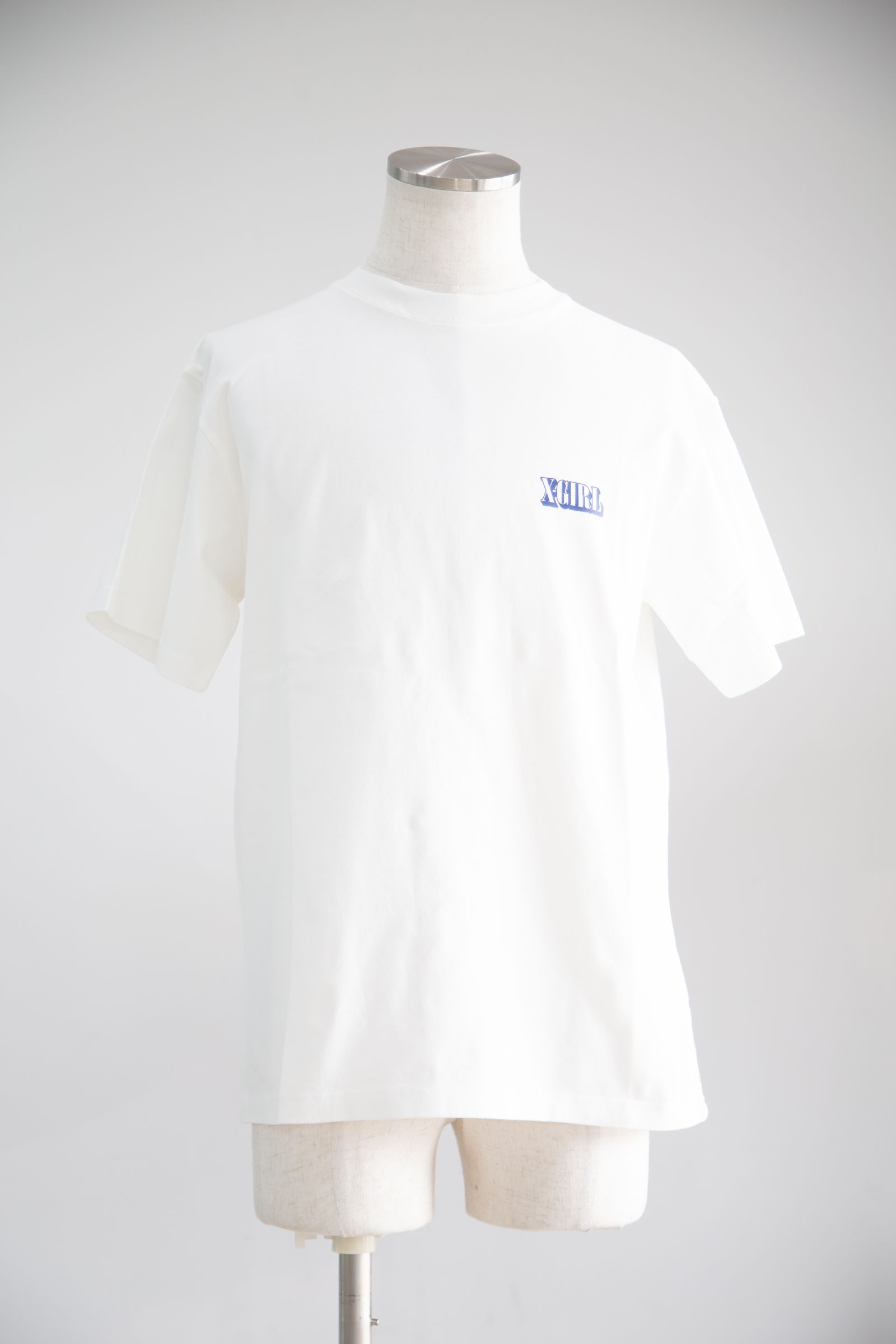 CIRCLE BACKGROUND FACE LOGO S/S TEE / ホワイト