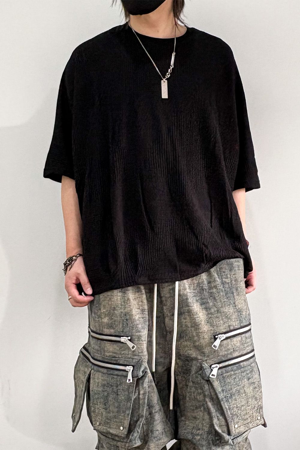 DEFORMED STRIPE PATTERN DOLMAN TEE / ブラック