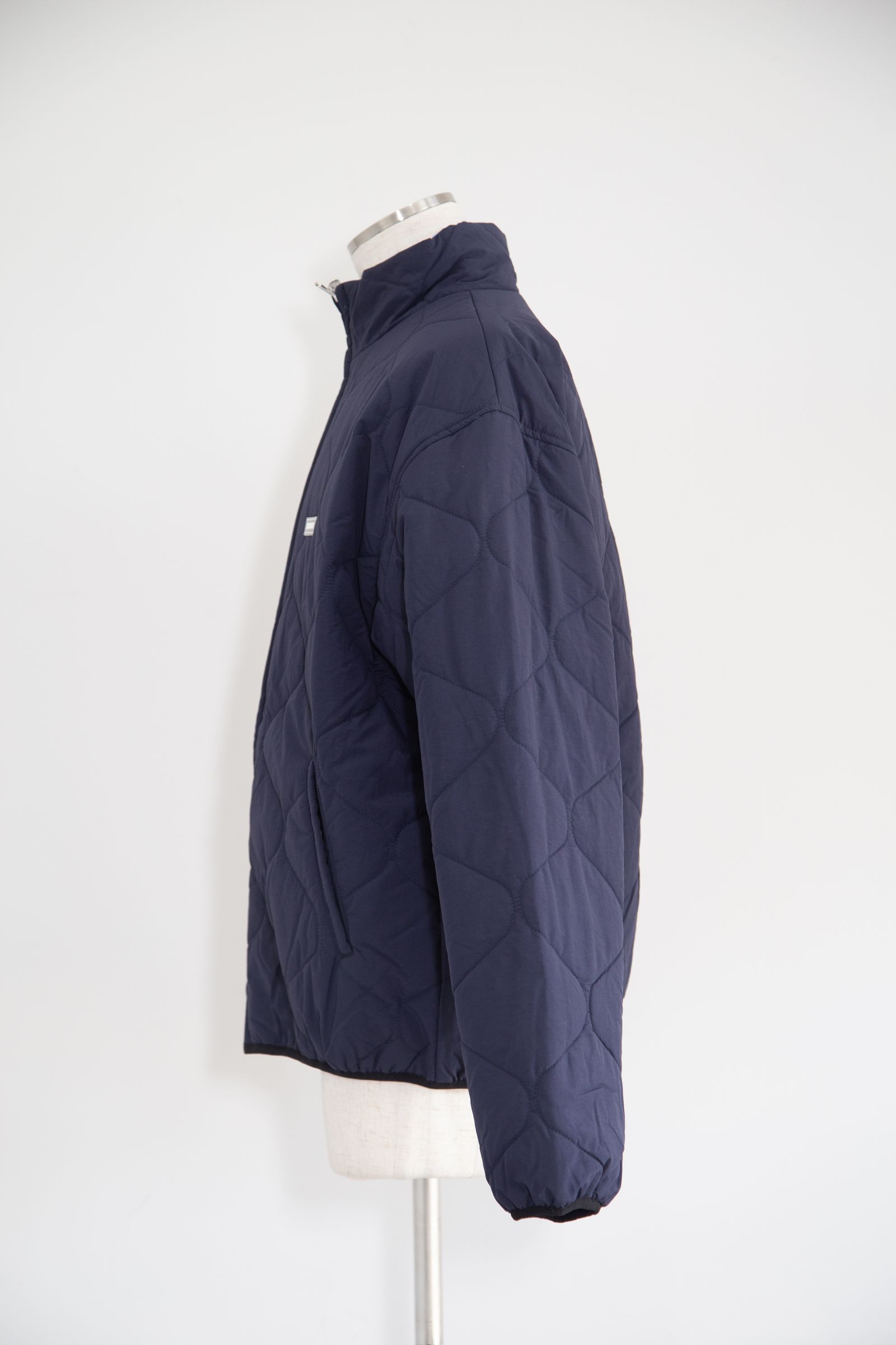 XLARGE - REVERSIBLE QUILTED JACKET / ネイビー | Tempt