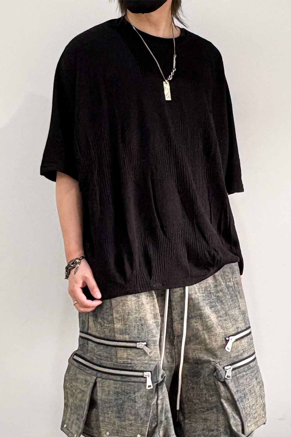 DEFORMED STRIPE PATTERN DOLMAN TEE / ブラック