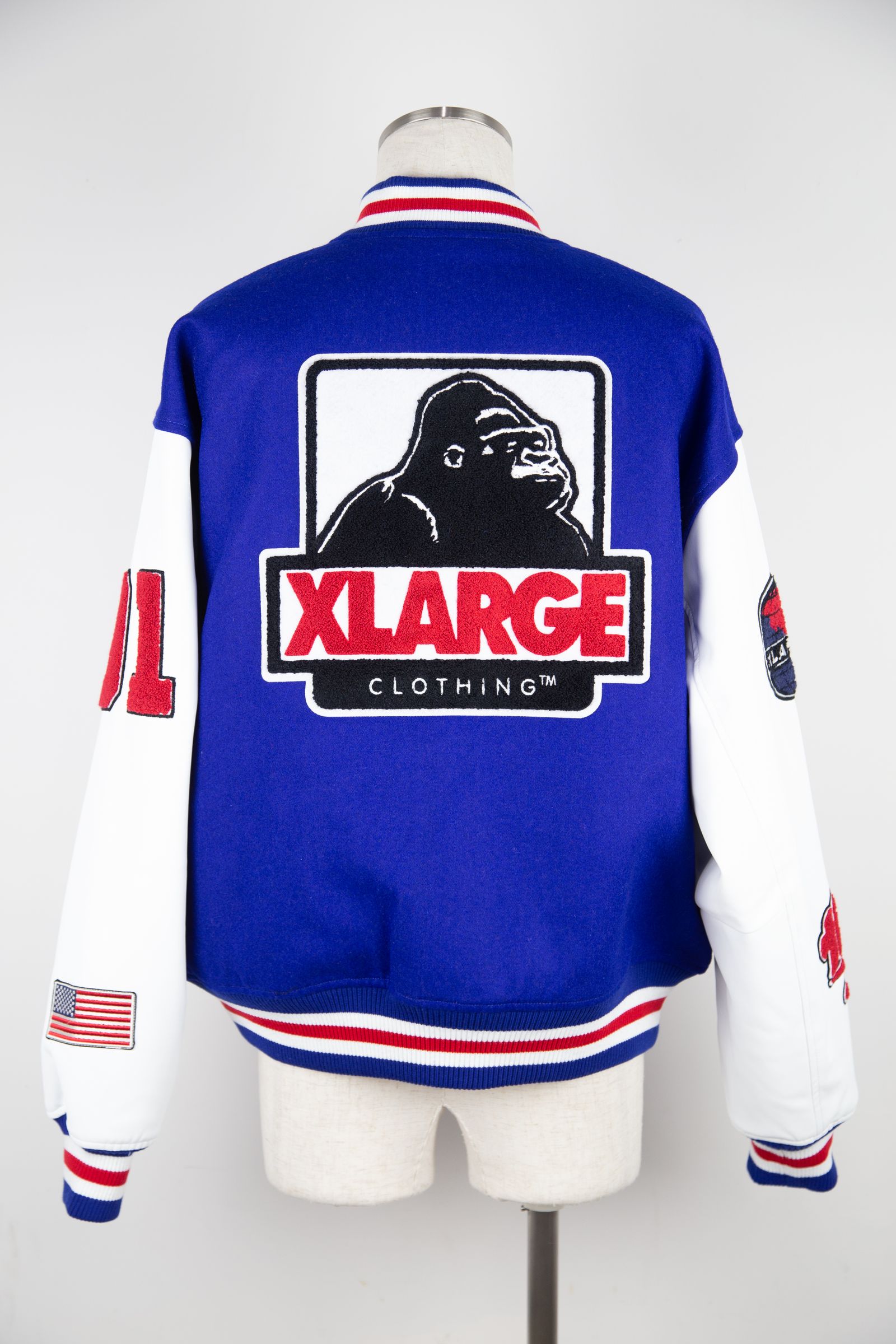 サマーセール35%オフ XLARGE OG LOGO VARSITY JACKETスタジャン ブルー