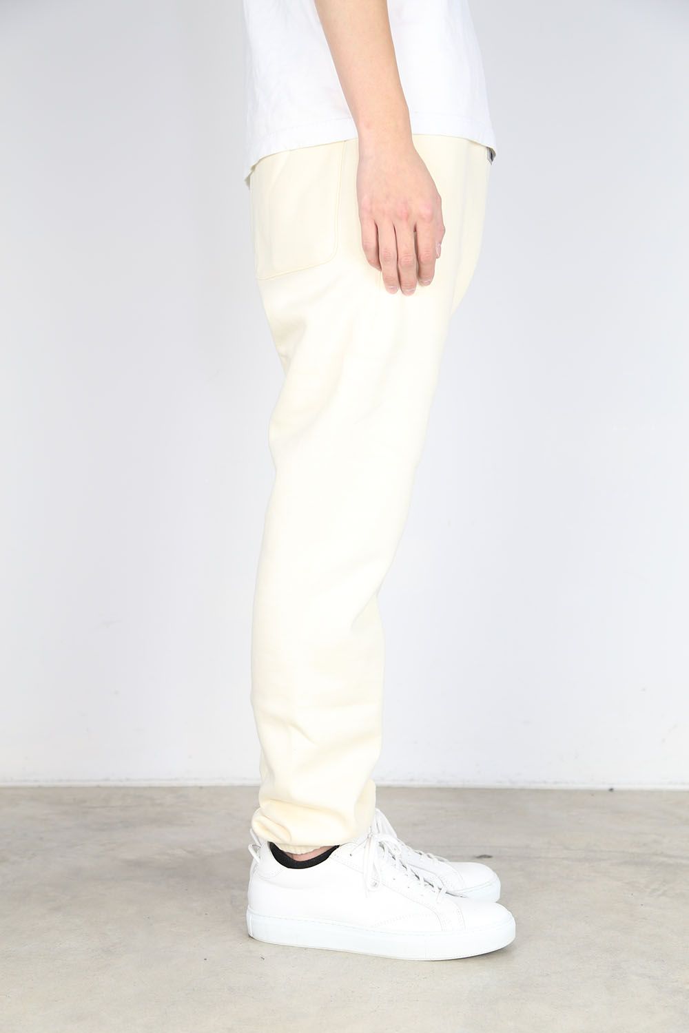 FRONT LOGO REFLECTOR SWEAT PANTS / クリーム