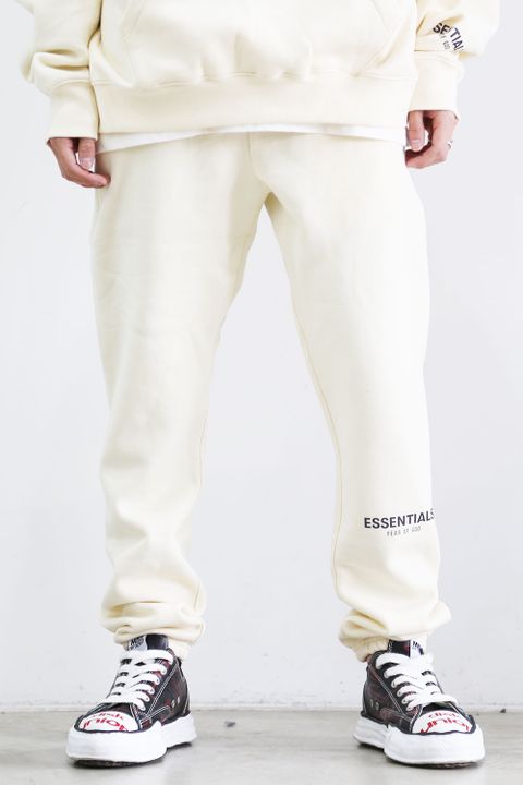 FRONT LOGO REFLECTOR SWEAT PANTS / クリーム