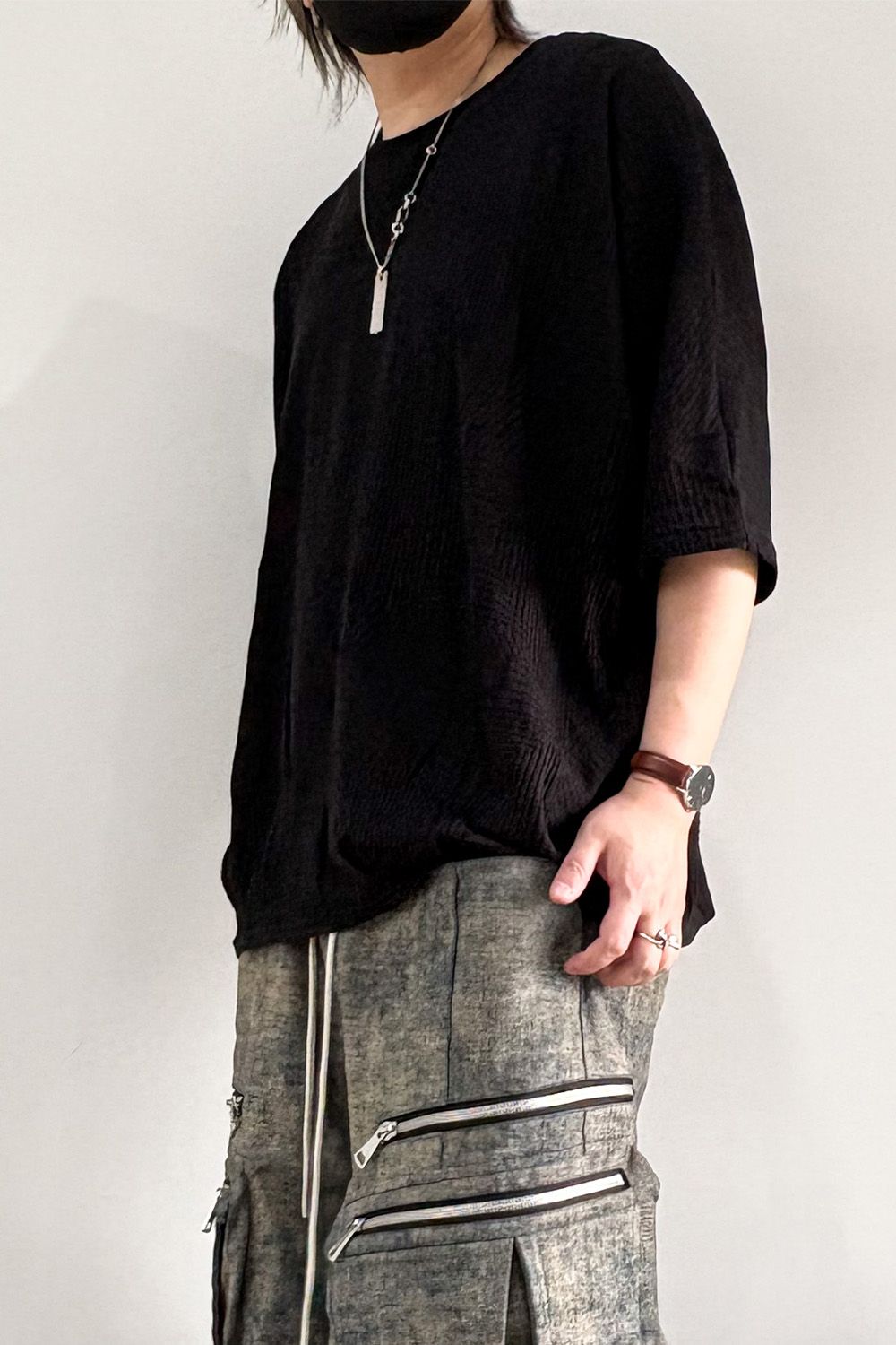 DEFORMED STRIPE PATTERN DOLMAN TEE / ブラック
