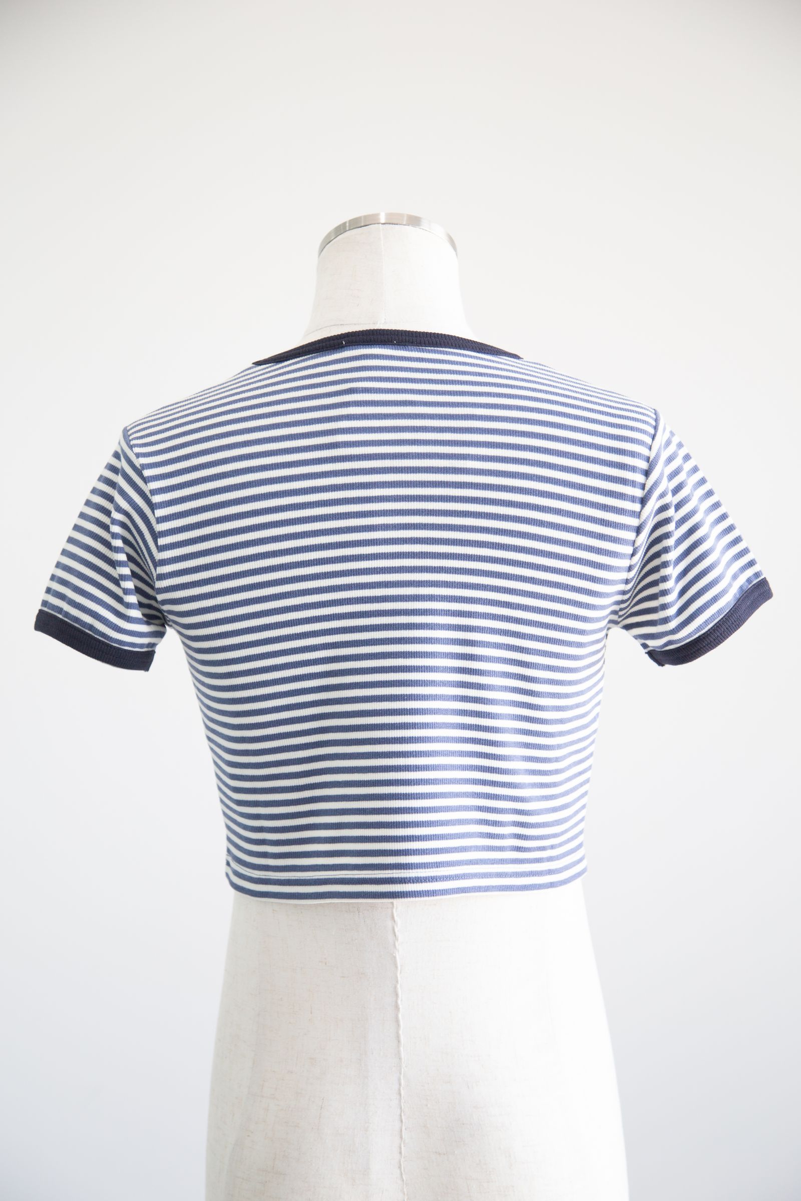 OUTLINE OVAL LOGO S/S TOP / マルチ