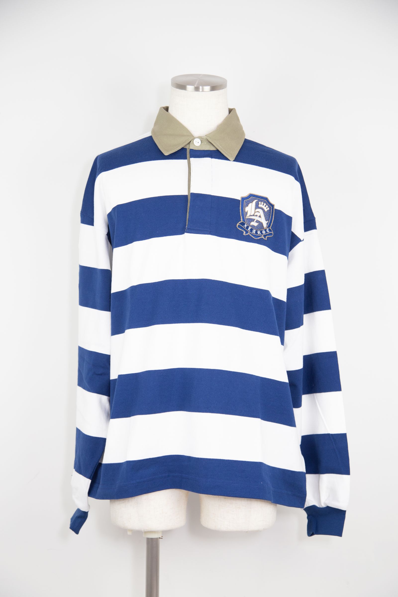 XLARGE - [ラスト1点 サイズM] EMBLEM STRIPED RUGBY SHIRT / ブラック