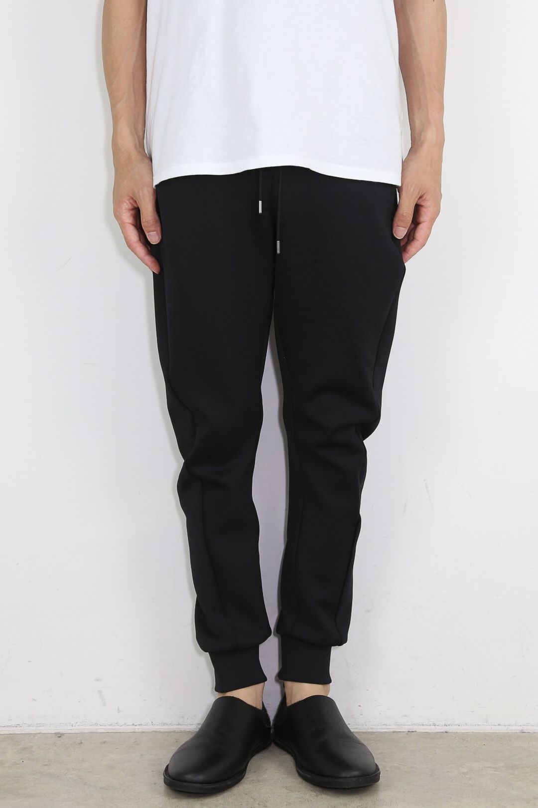 PE STRETCH SMOOTH ZIP JOGGER TROUSERS / ブラック