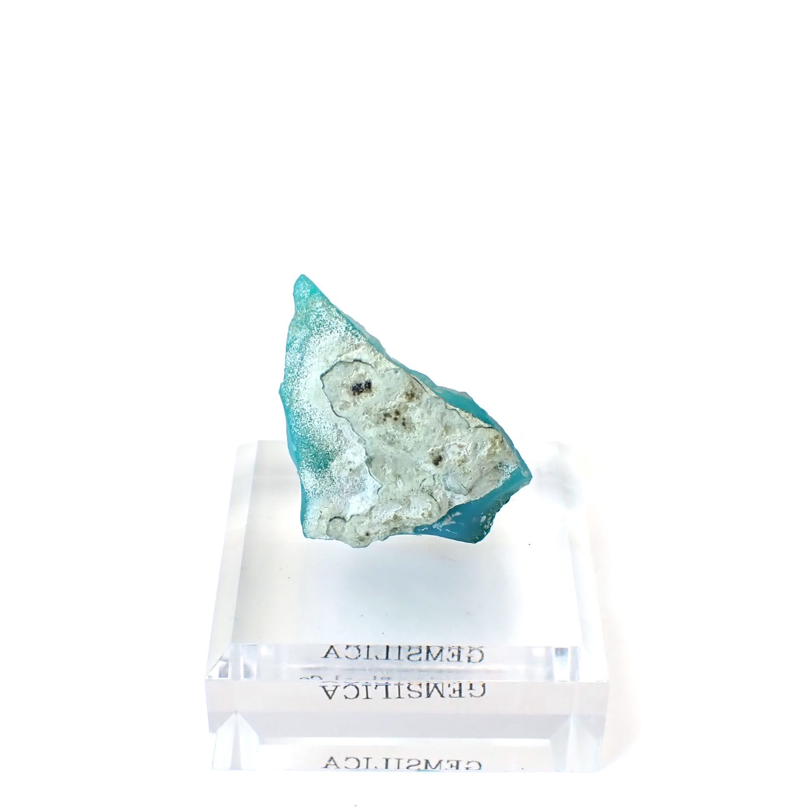 ジェムシリカ原石 アメリカ・アリゾナ州レイマイン産 アクリル台座付き 108.56ct(21.71g) / 20.7x31.4x39.5mm前後 [260632496]