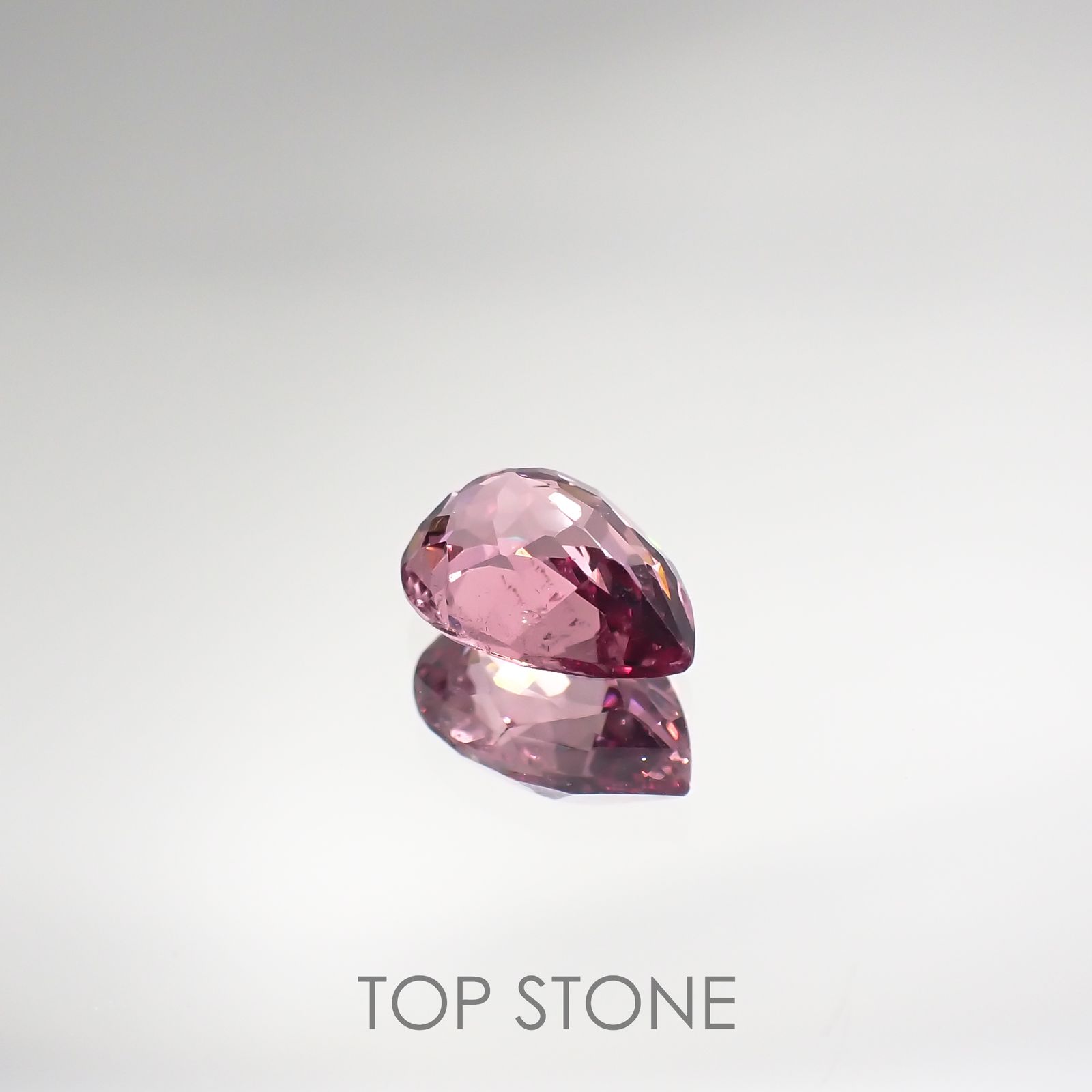 マラヤガーネット(宝石名アルマンディン スペサルティン パイロープ・ガーネット) タンザニア産 2.333ct ソ付(彩珠)[210711880]9.6×6.8mm前後