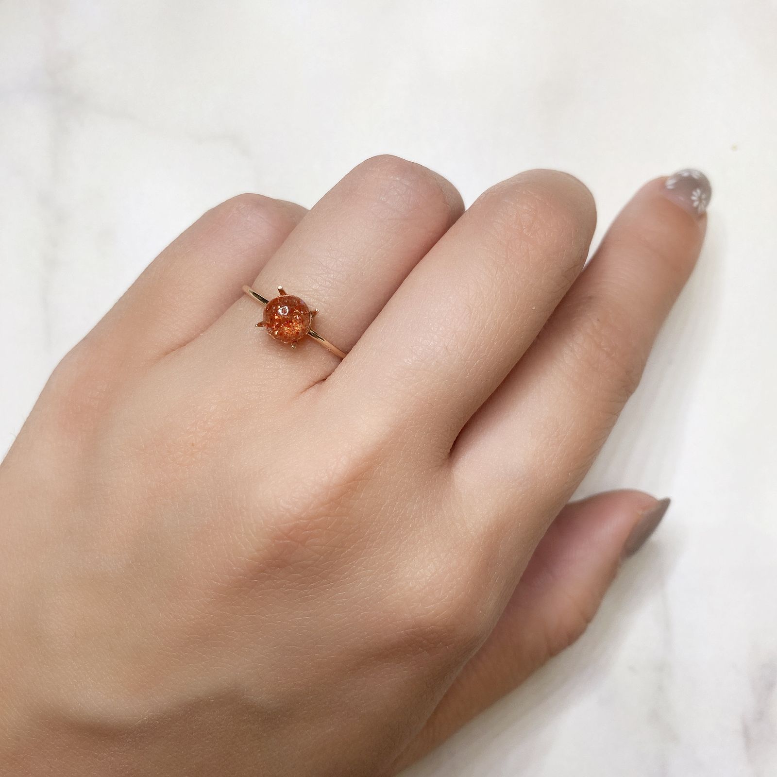 イリュージョンサンストーン(宝石名フェルドスパー) タンザニア産 0.75ct 識別済[210812306]5.8×5.7mm前後
