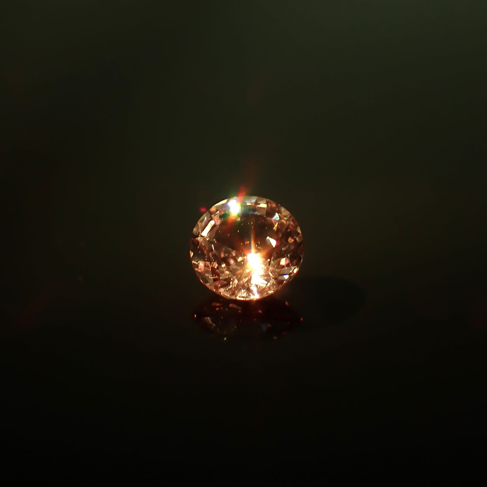 ドラゴンガーネット タンザニア産 0.55ct / 4.9x4.9mm前後 [260732667]