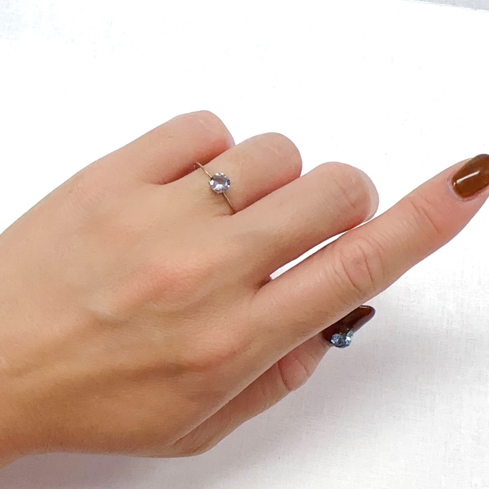 マリアライト(宝石名パープル・スキャポライト)タンザニア産 0.41ct 識別済[231023981]5.1x5mm前後
