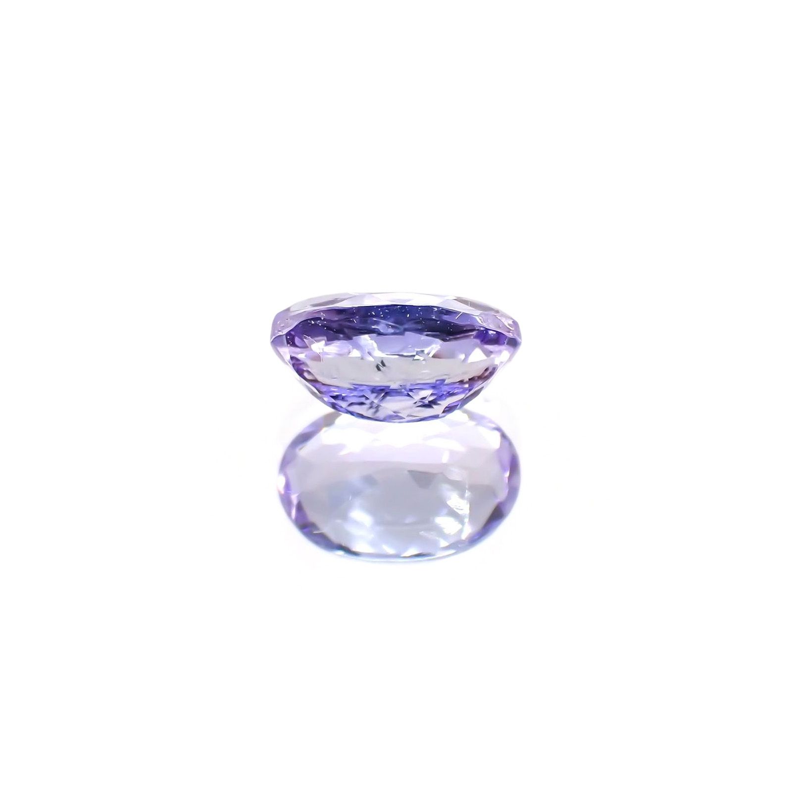 ラベンダーゾイサイト(宝石名ゾイサイト) タンザニア産 識別済 0.59ct / 6.2x4.1mm前後 [21019347]