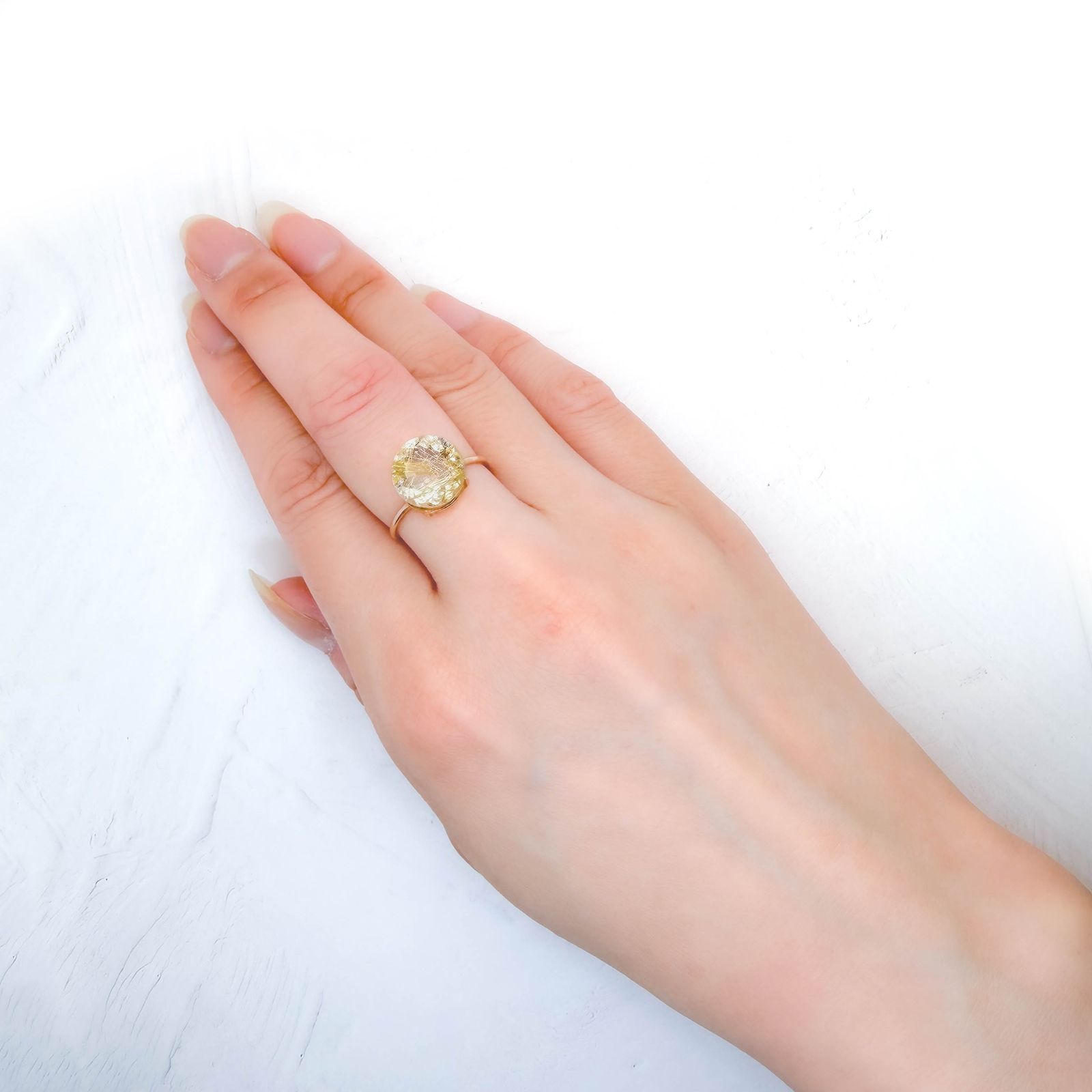 ルチルクォーツ ブラジル産 3.58ct / 10.6x10.7mm前後 [260732407]