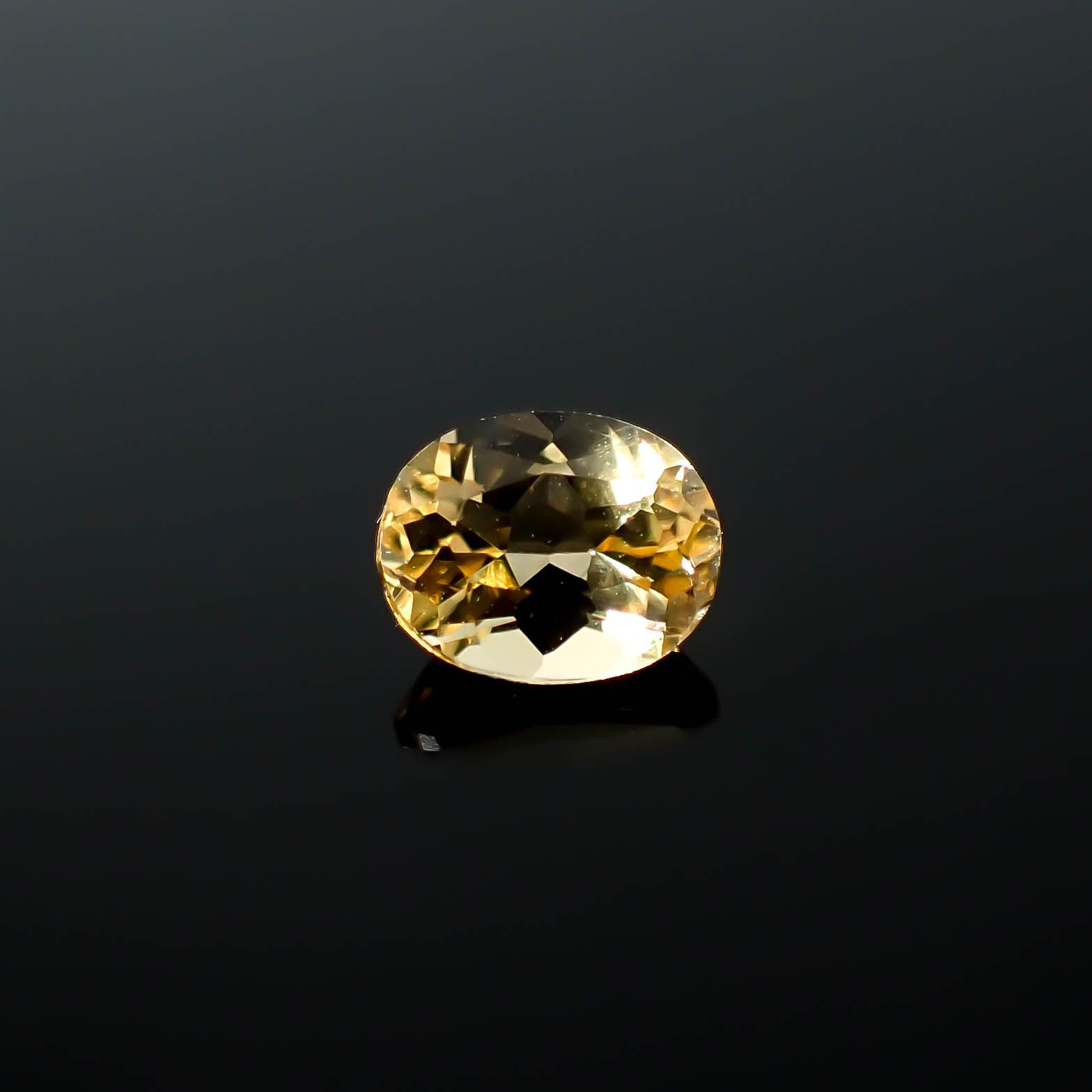 インペリアルトパーズ(宝石名トパーズ)ブラジル産 0.78ct / 6.2x4.9mm前後 [250630493]