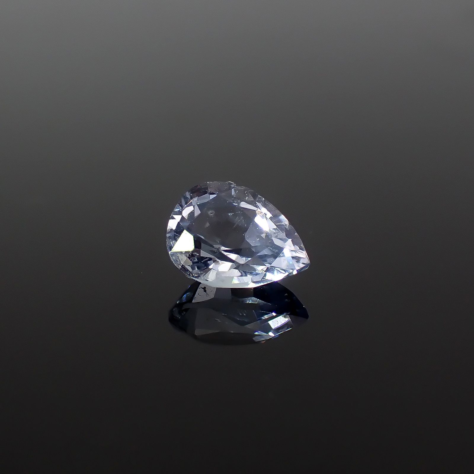 テネブレッセンススキャポライト アフガニスタン産 0.48ct / 6.4x4.6mm前後 [260432039]