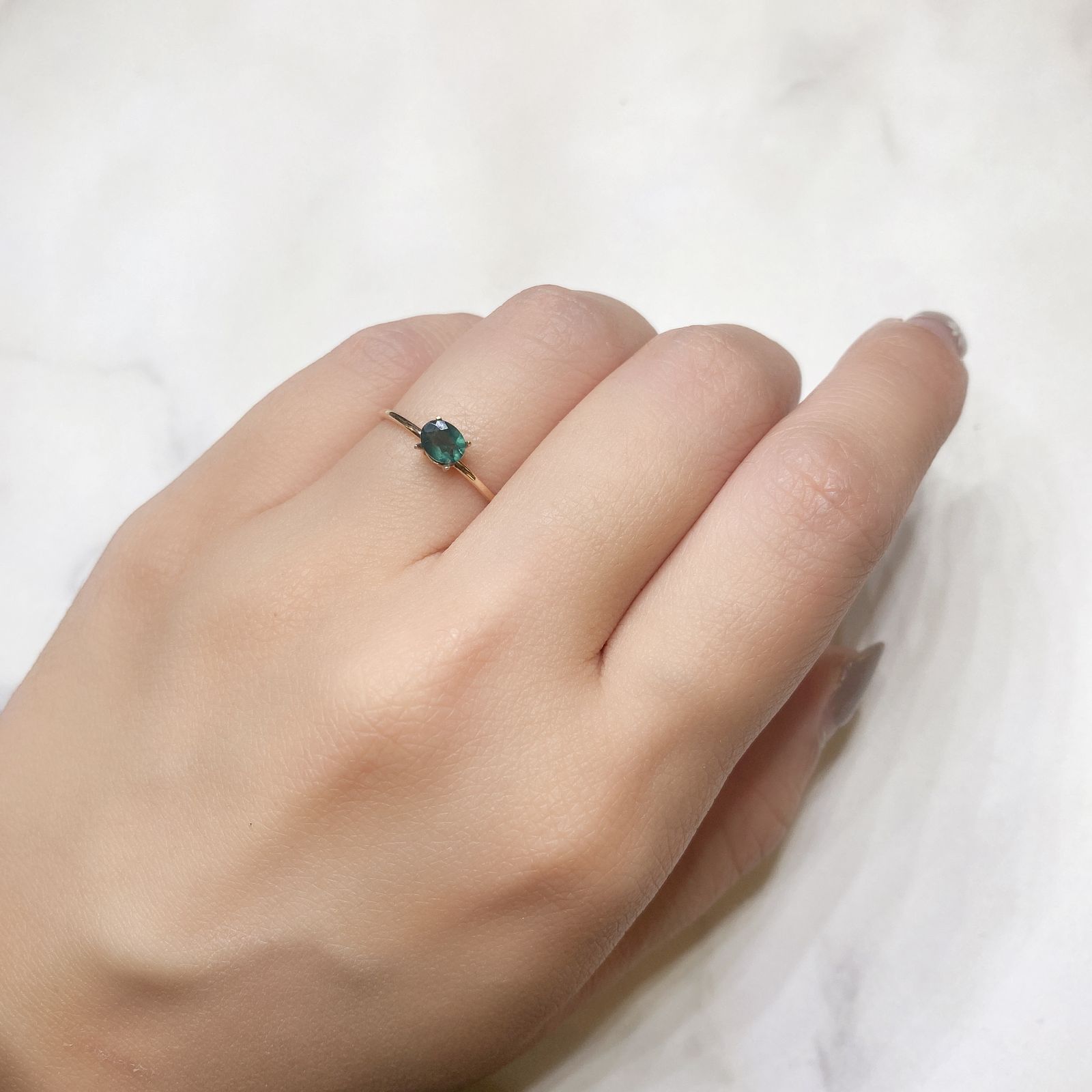 グリーンアパタイト(ノーブルモロキサイト)(宝石名アパタイト) マダガスカル産 0.26ct 識別済[211013537]4.9×3.8mm前後