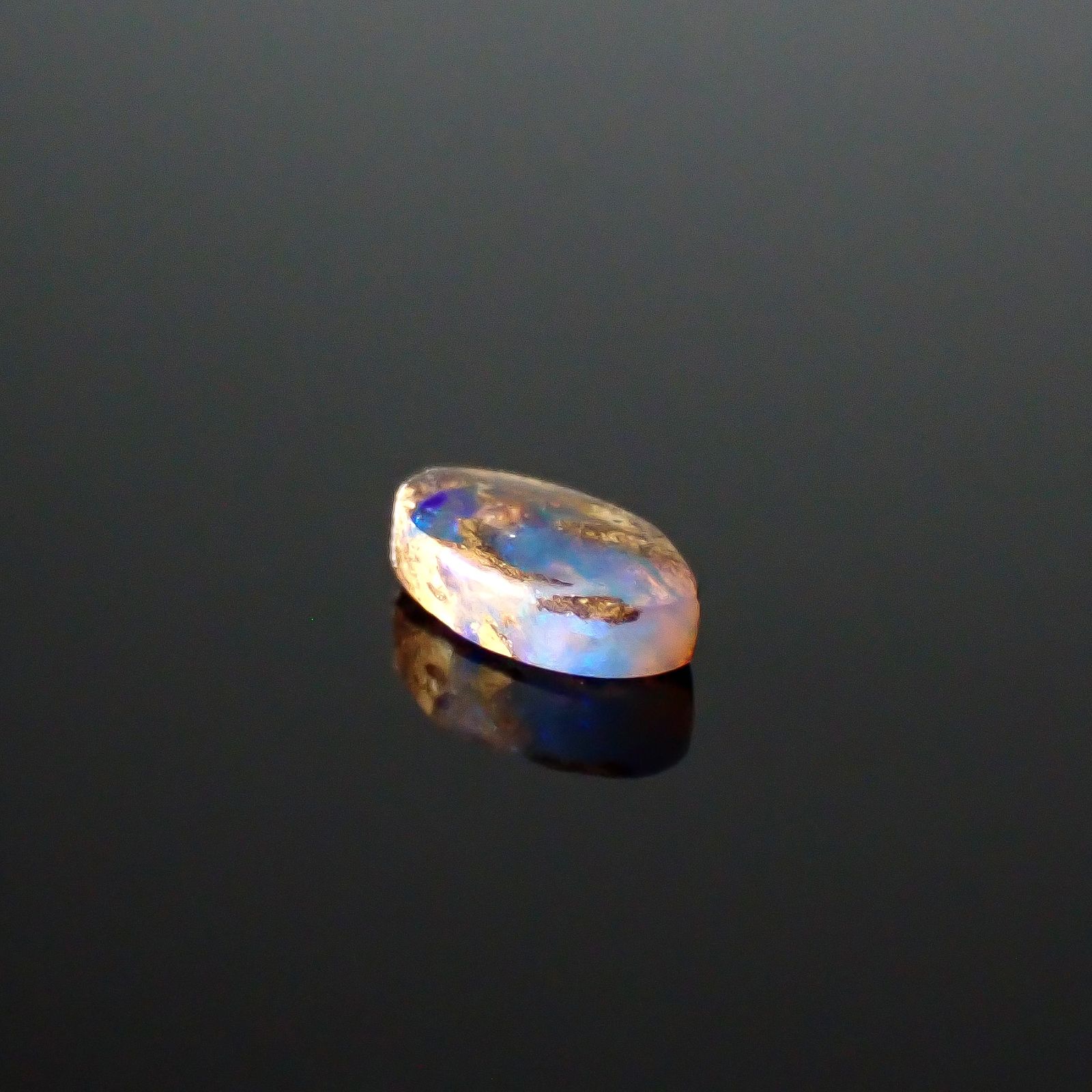 ウッドオパール オーストラリア産 0.28ct / 6.1x3.5mm前後 [251031201]