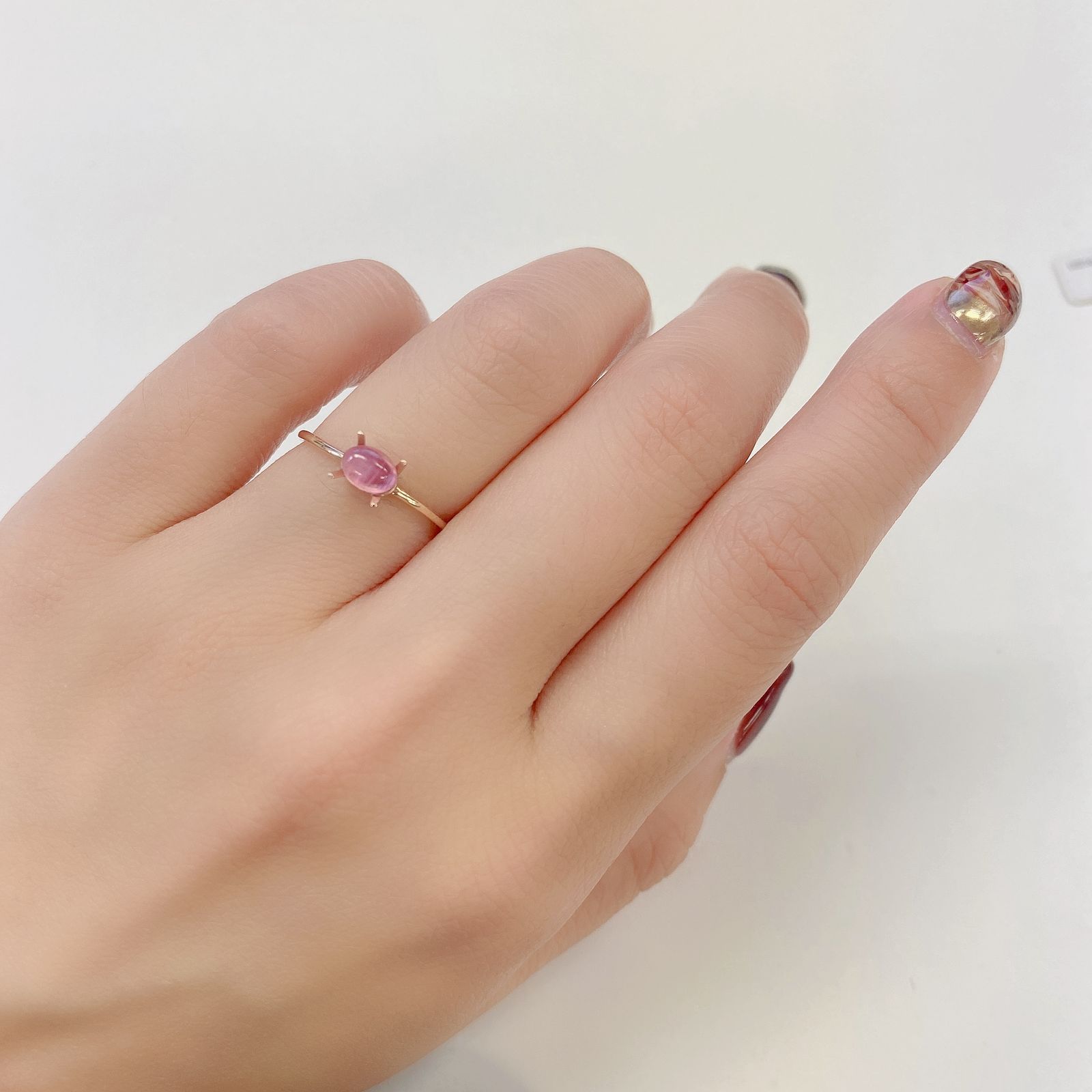 ペツォッタイトキャッツアイ(ラズベリル)(宝石名ペツォッタイト・キャッツアイ) マダガスカル産 0.433ct ソ付(彩珠)[210711983]4.9×3.9mm前後