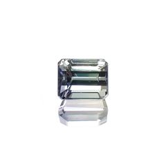 バイカラータンザナイト(宝石名バイカラー・ゾイサイト) タンザニア産 ソ付(彩珠) 0.618ct / 4.7x3.7mm前後 [210711579]