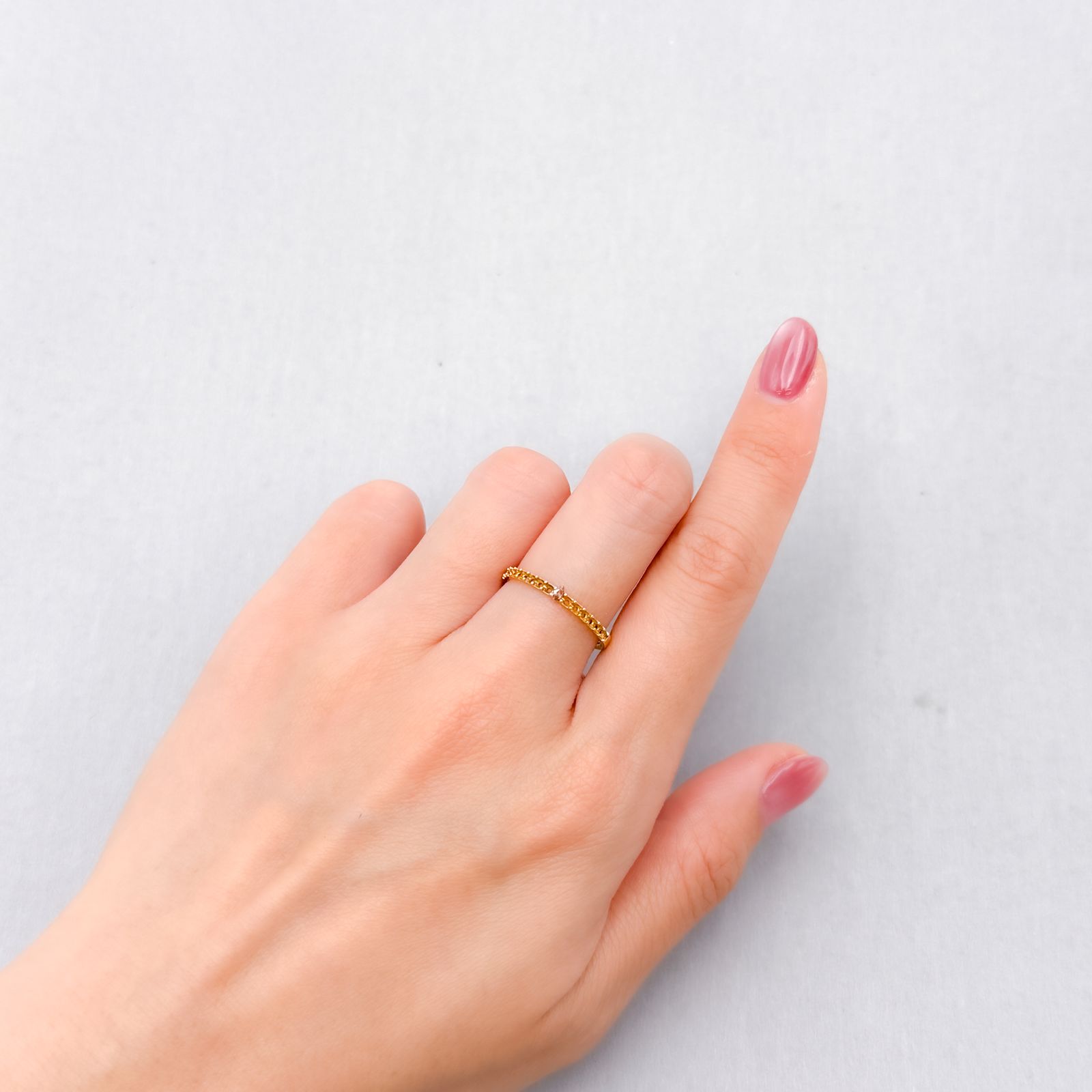 ピンクダイヤモンド(宝石名ダイアモンド VS-2/FANCY DEEP BROWNISH PINK) 0.033ct ソ付(AGT)[250129709]2.58x1.66mm前後