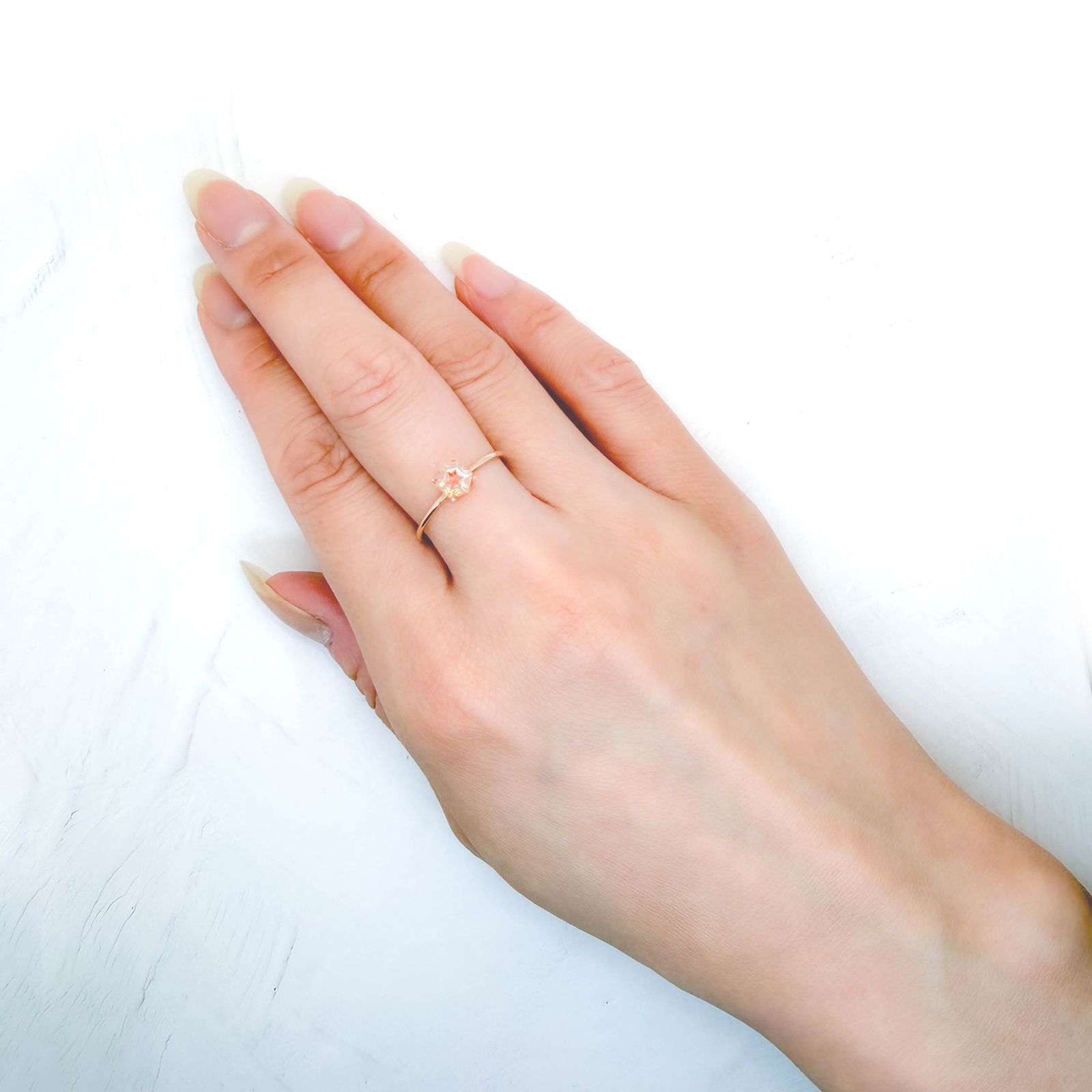 ◇ヘキサゴンカット◇オレゴンサンストーン アメリカ・オレゴン州産 0.44ct / 4.9x4.9mm前後 [260732646]