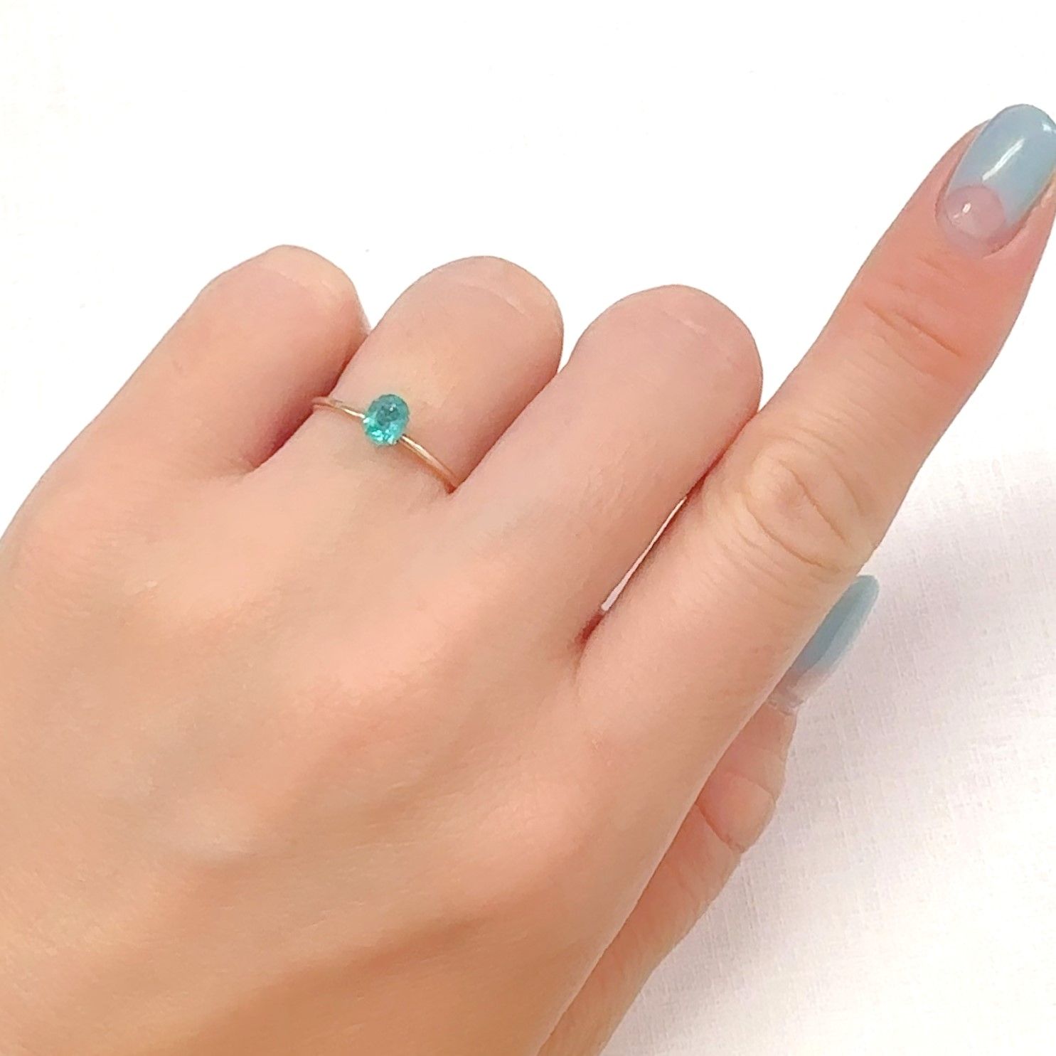 パライバトルマリン ブラジル・パライバ州バターリャ鉱山産 0.33ct[240928738]5x4mm前後