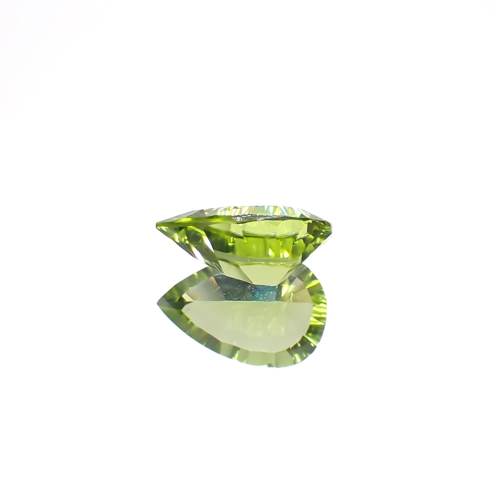 ◇コンケーブカット◇ペリドット 中国産 1.22ct[230622287]9x6mm前後