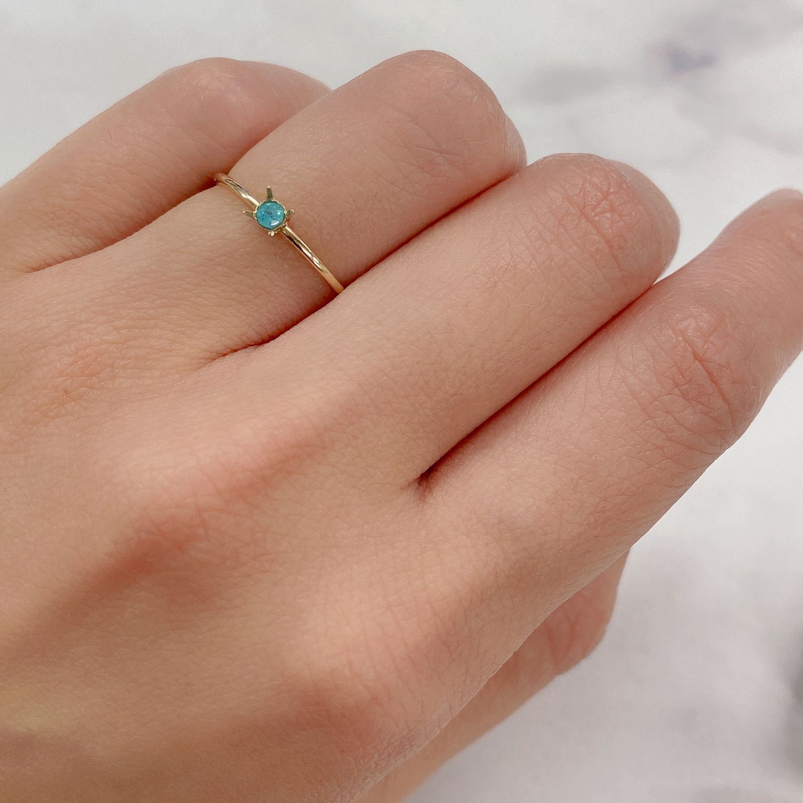 パライバトルマリン(宝石名トルマリン/別名パライバ・トルマリン) ブラジル・パライバ州バターリャ鉱山産 0.053ct 識別済[20116966]2.3×2.3mm前後
