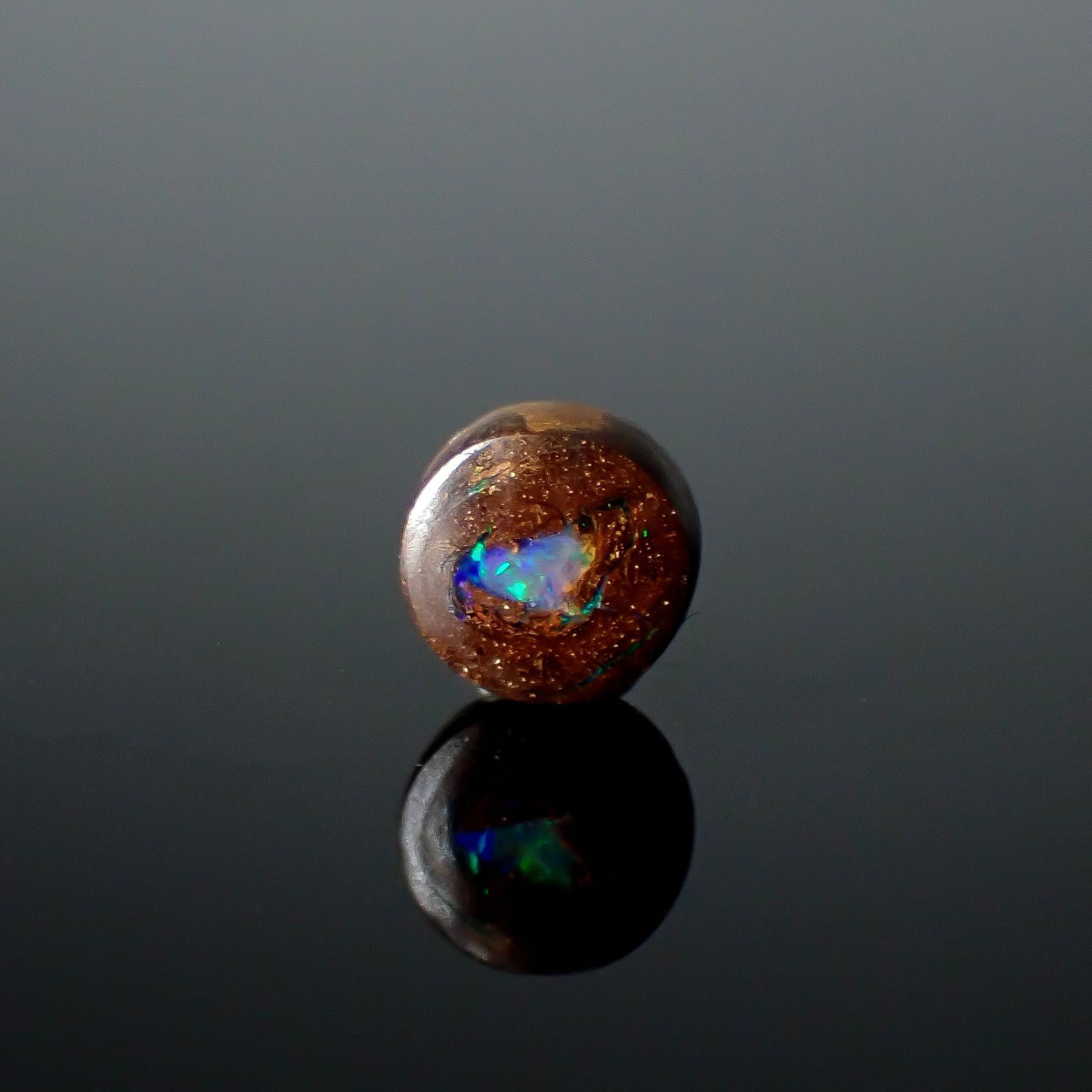 ウッドオパール オーストラリア産 0.88ct / 6.1x6mm前後 [251031200]