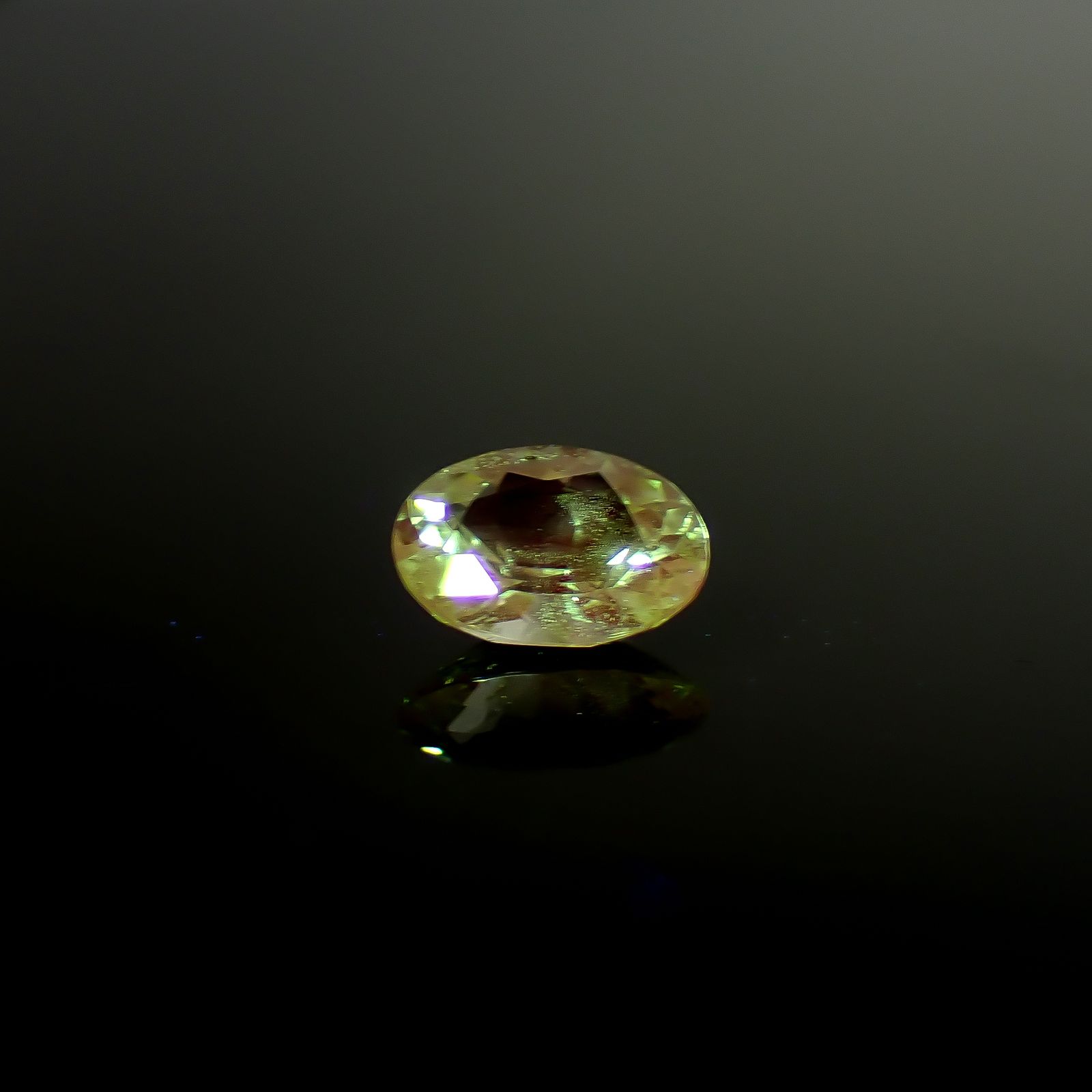 ミントガーネット タンザニア産 0.65ct / 6.4x4.7mm前後 [260932676]