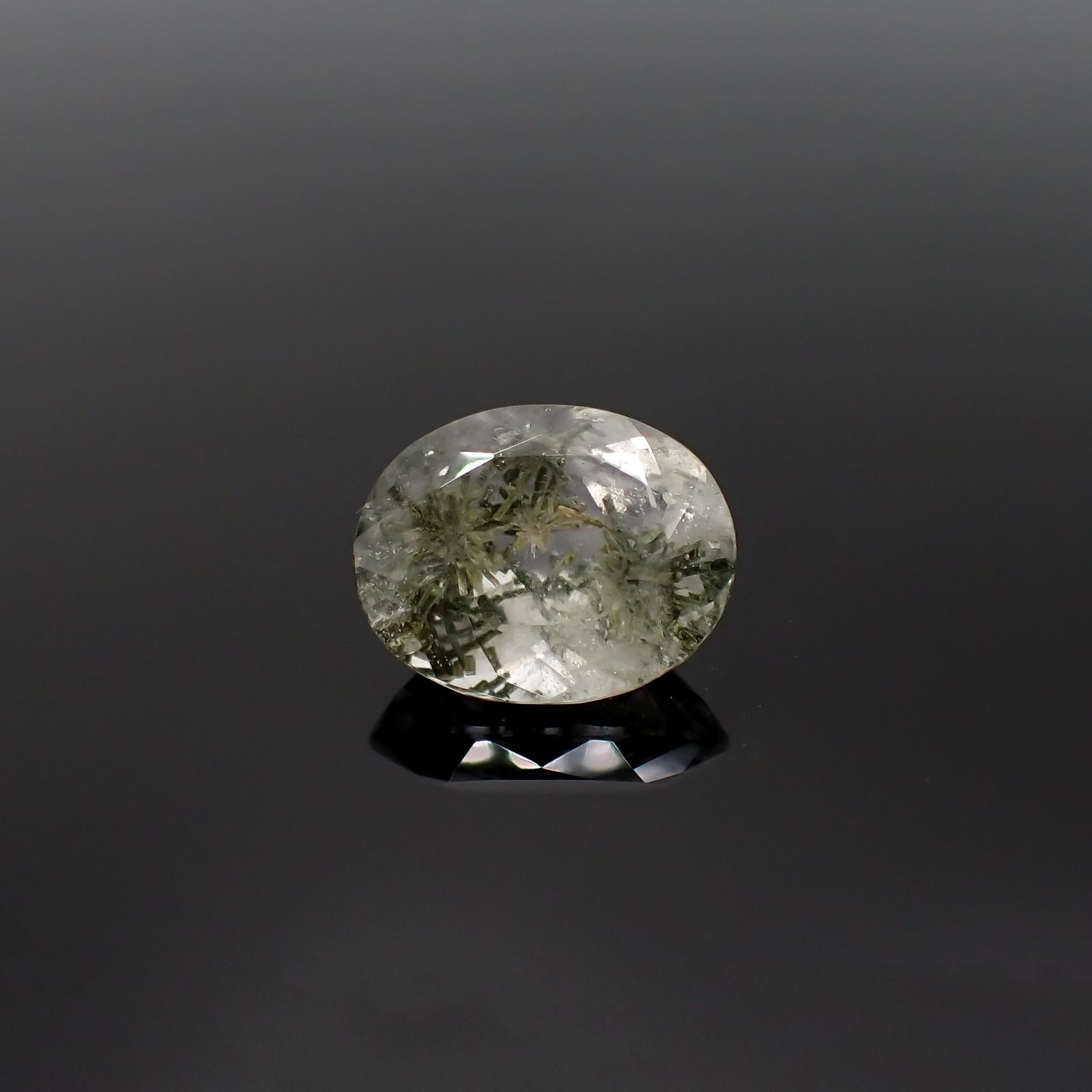 ヘデンベルジャイトインクォーツ インドネシア産 6.94ct [220917824]14.4x11.5mm前後