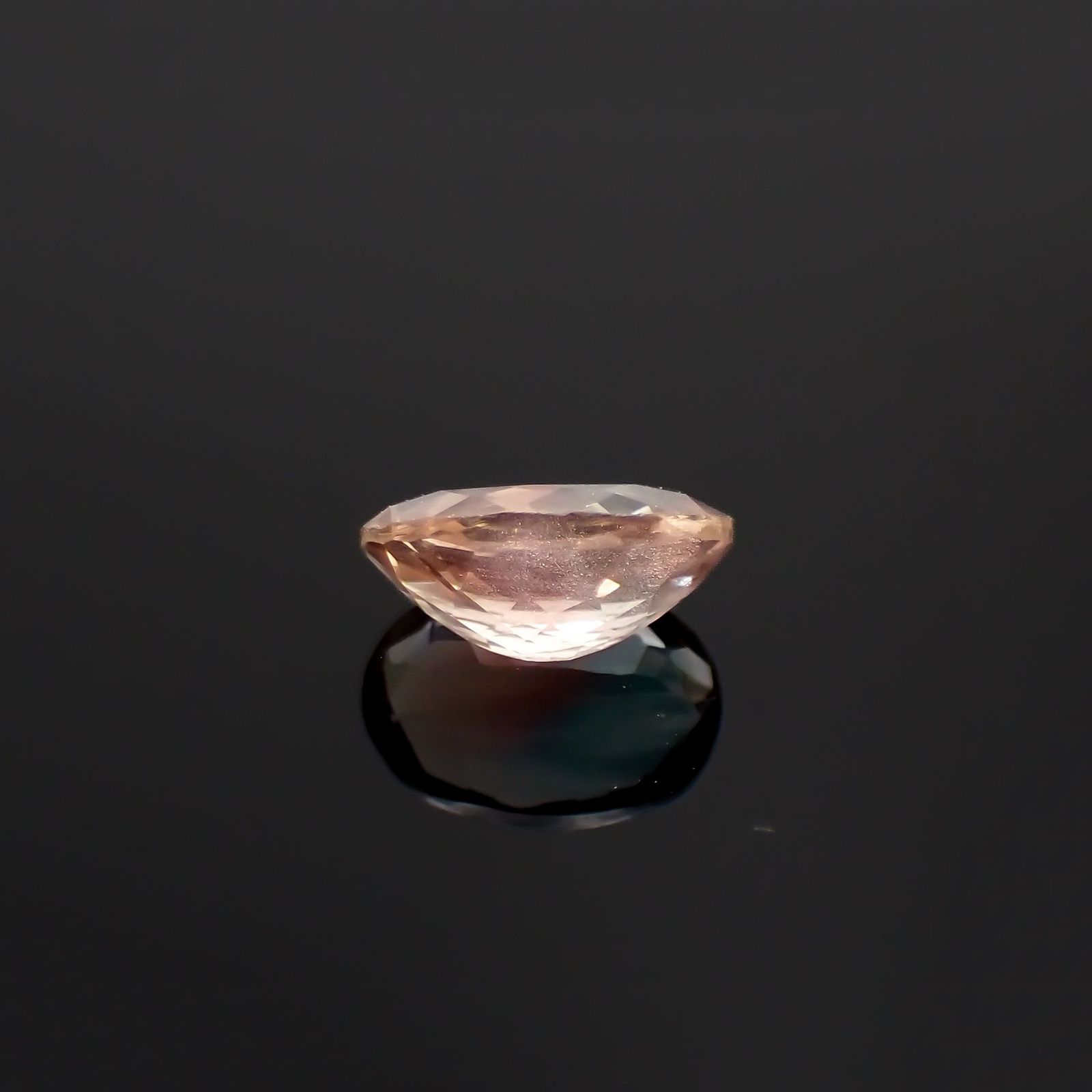 パーティカラーオレゴンサンストーン アメリカ・オレゴン州産 0.93ct / 7.8x5.7mm前後 [230722847]