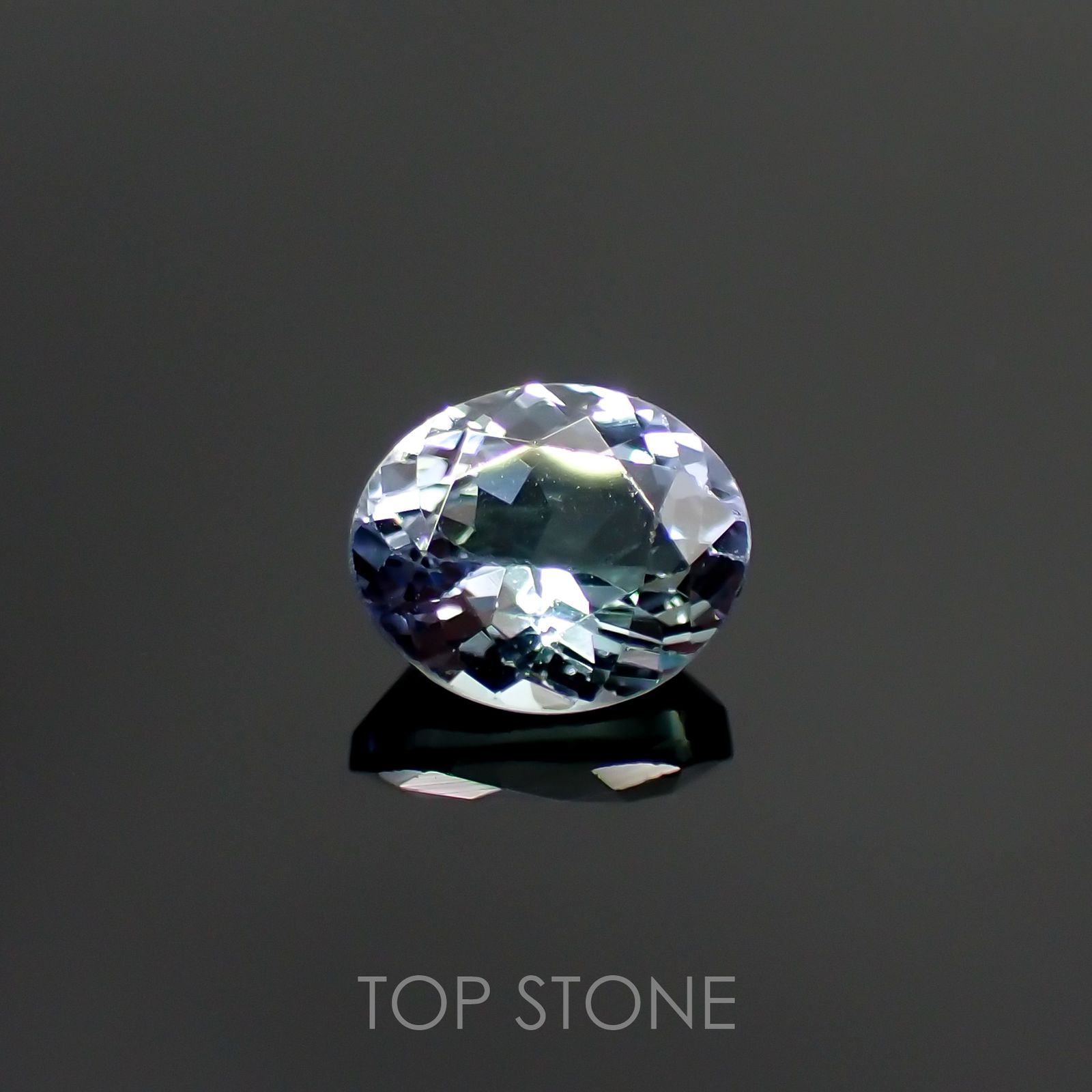 バイカラータンザナイト(宝石名バイカラー・ゾイサイト) タンザニア産 0.95ct 識別済[210912645]6.7×5.6mm前後