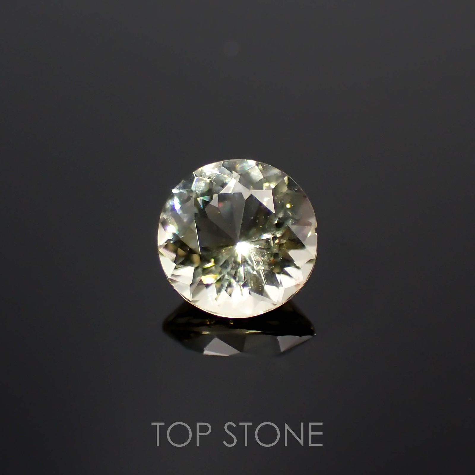 イエロースキャポライト(宝石名イエロー・スキャポライト)タンザニア産 0.43ct 識別済[221219401]5x5mm前後