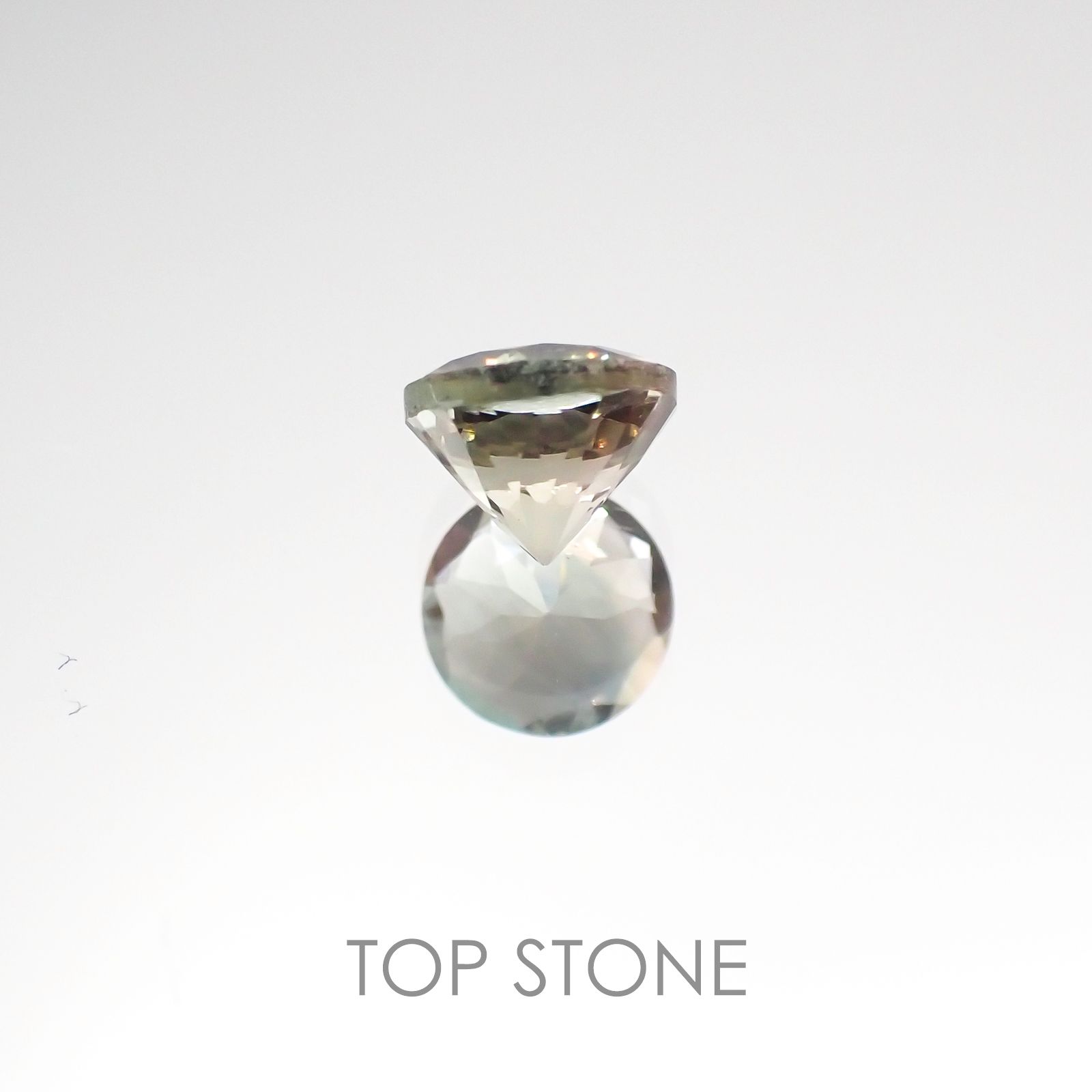 バイカラーオレゴンサンストーン アメリカ産 ルース 0.52ct[20107098]5.1×5.1mm前後