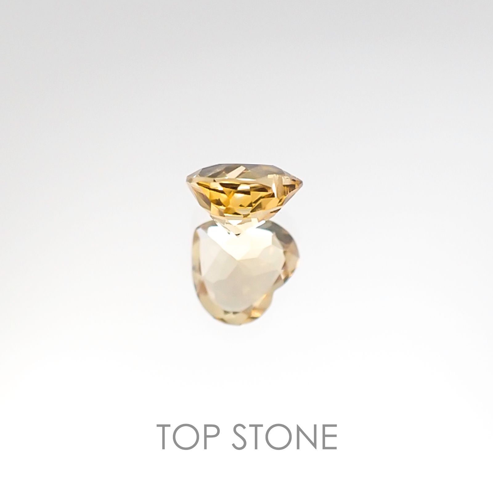 インペリアルトパーズ ブラジル産 ルース 0.5ct[20106514]5.2×4.9mm前後
