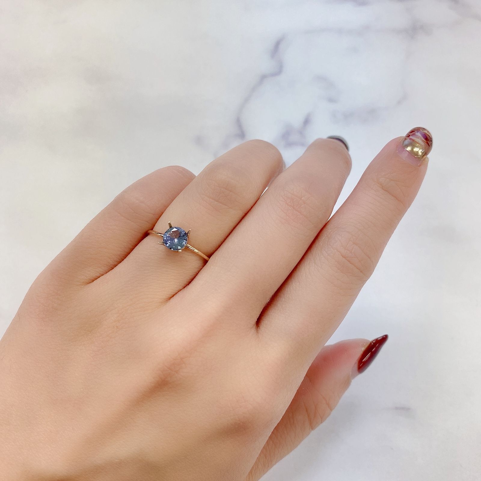 バイカラータンザナイト(宝石名タンザナイト) タンザニア産 0.69ct 識別済[210812665]5.7×5.6mm前後