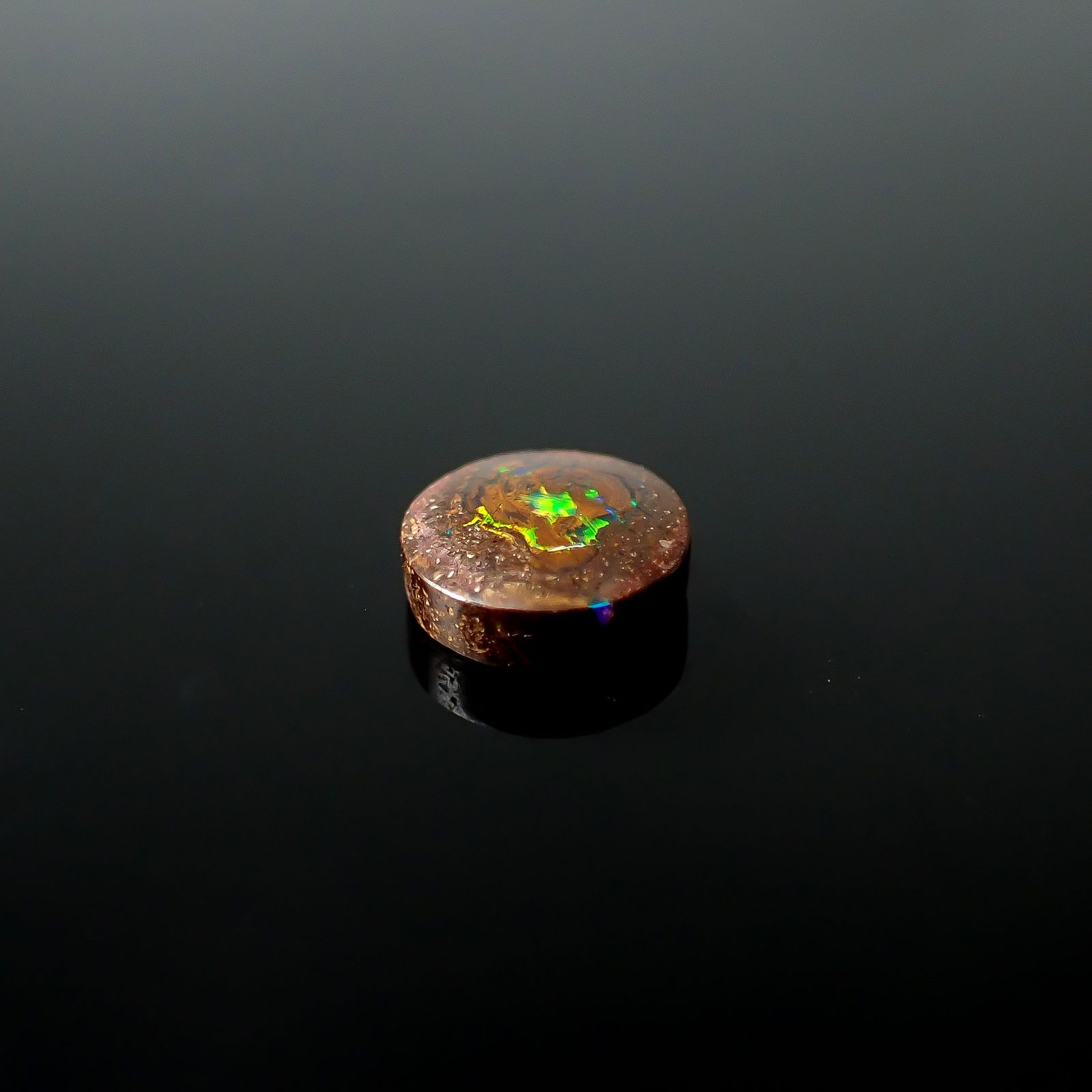 ウッドオパール オーストラリア産 0.89ct / 6.6x6.5mm前後 [251131294]