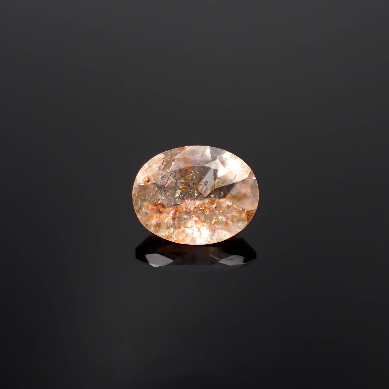 イリュージョンサンストーン タンザニア産 1.59ct / 9x7.1mm前後 [230120119]