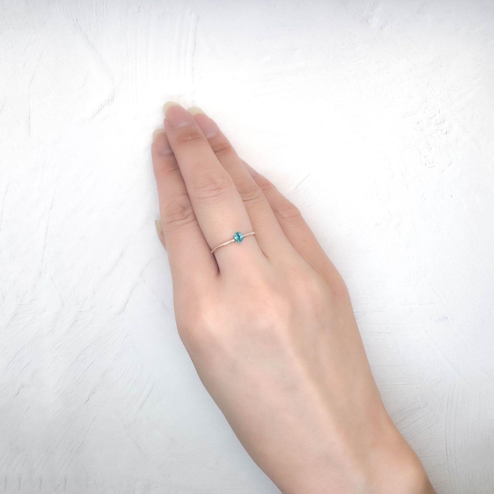 パライバトルマリン(宝石名トルマリン/別名パライバ・トルマリン)ブラジル・パライバ州バターリャ鉱山産 0.118ct ソ付(GGS)[250931069]4.1x2.8mm前後